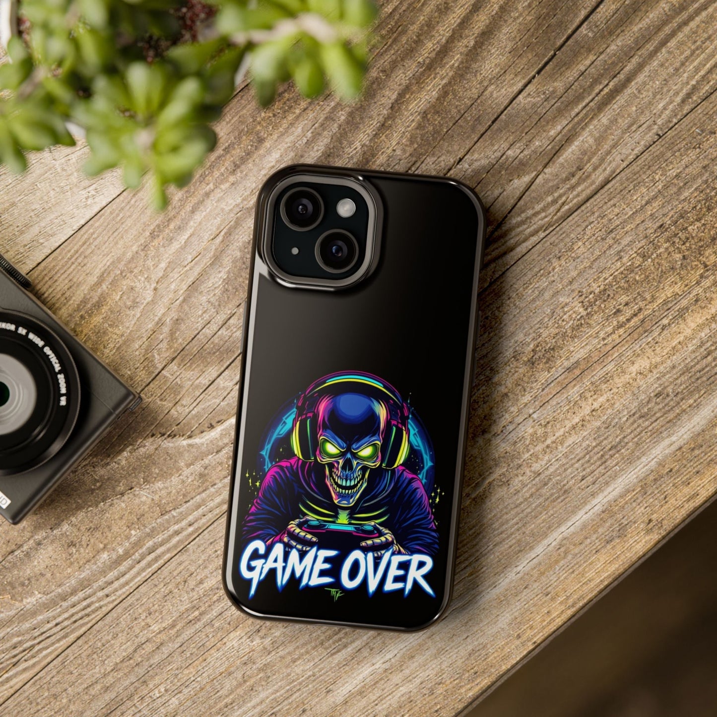 Game Over Gamer iPhone tough case with vibrant skull and headphones design, durable MagSafe compatible cover