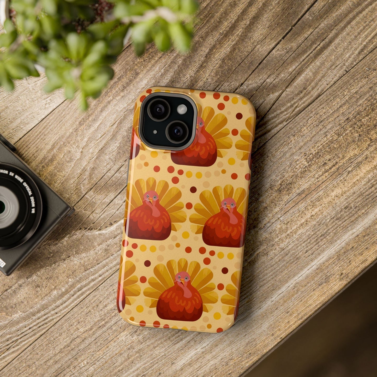 Turkey Celebration iPhone Case with vibrant turkey design and dual-layer protection on wooden surface