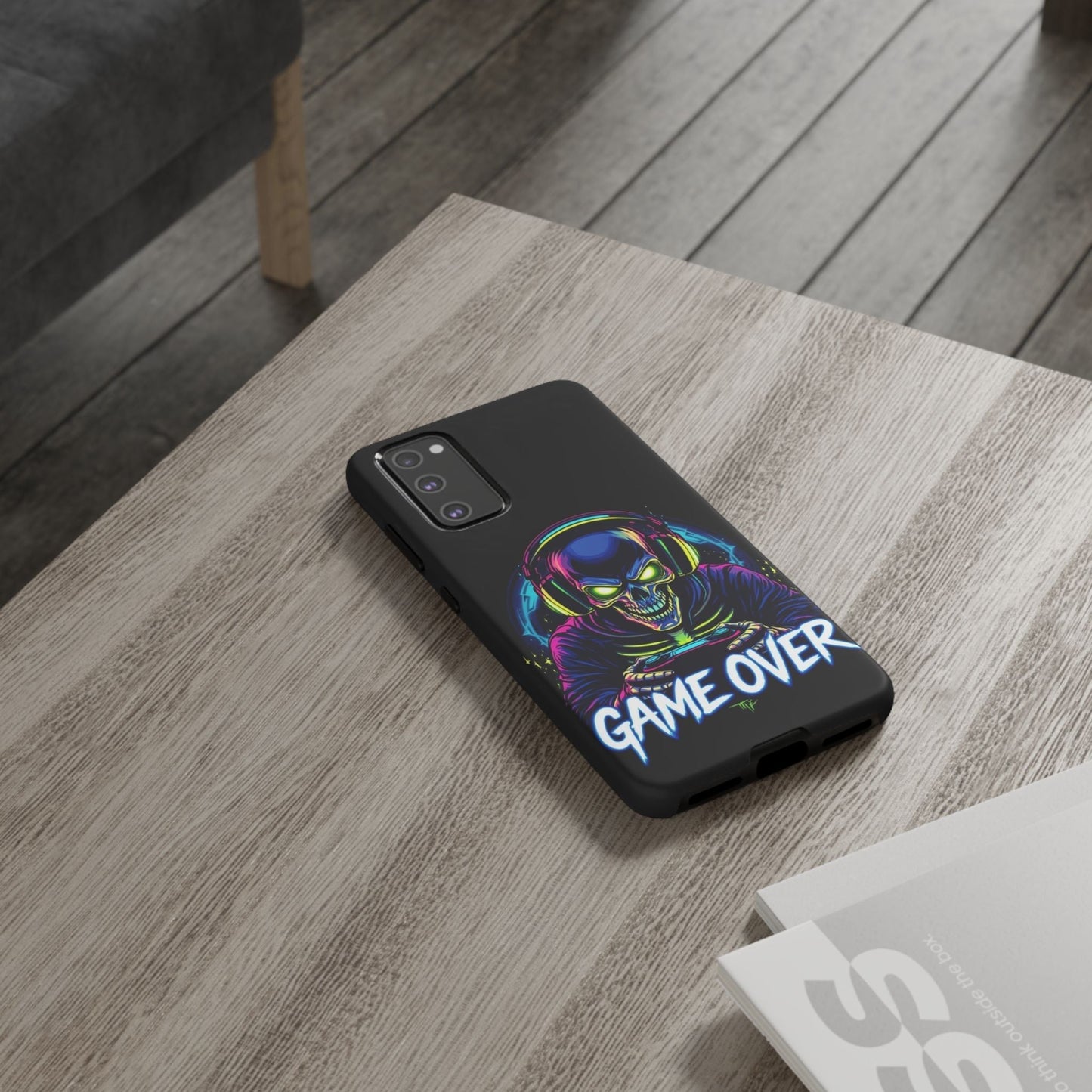 Samsung phone with Game Over Design durable impact-resistant tough case featuring a colorful skeleton gamer graphic and bold text