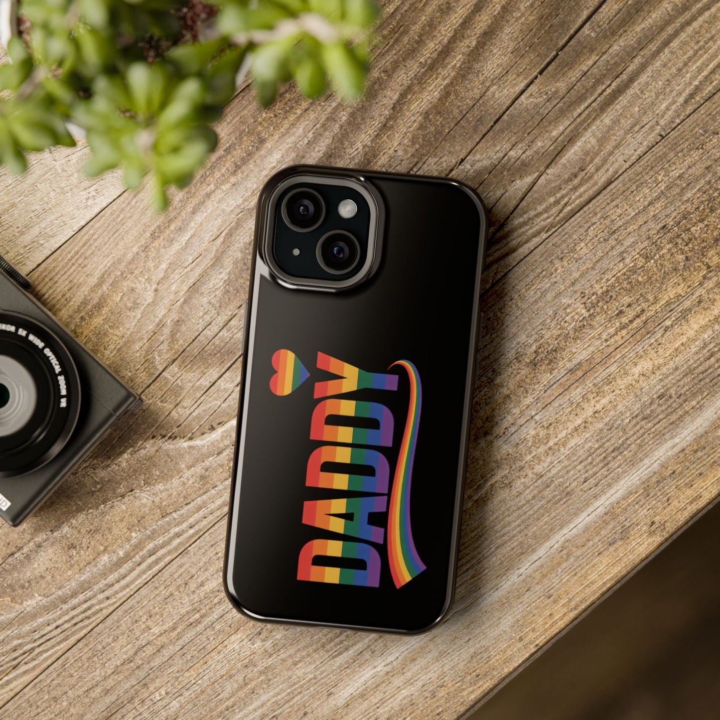 Fun Daddy LGBT Daddy iPhone tough case with rainbow text and heart on black background, protective dual-layer design with MagSafe compatibility