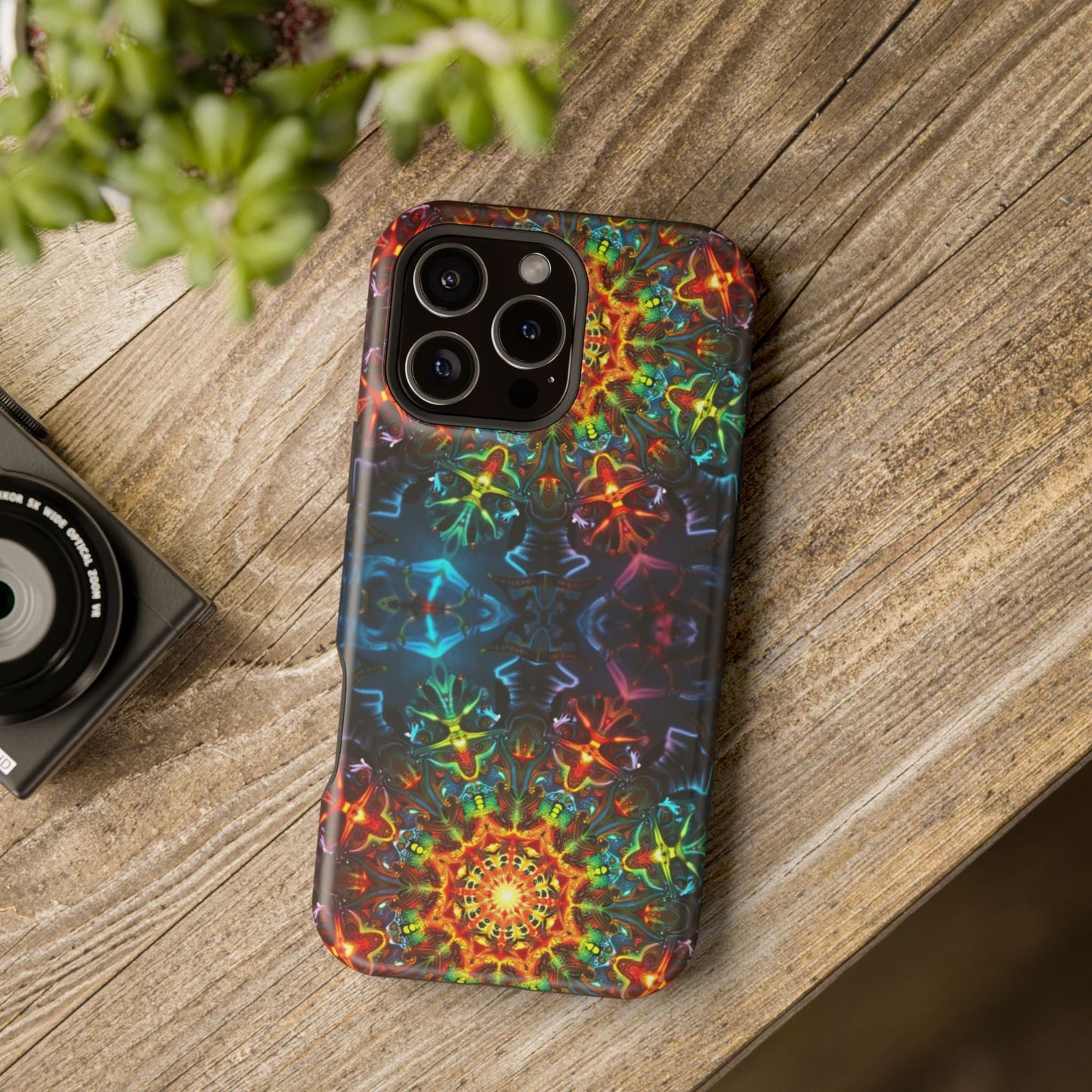 iPhone case with vibrant abstract kaleidoscope design, durable protective shell, and colorful artistic pattern
