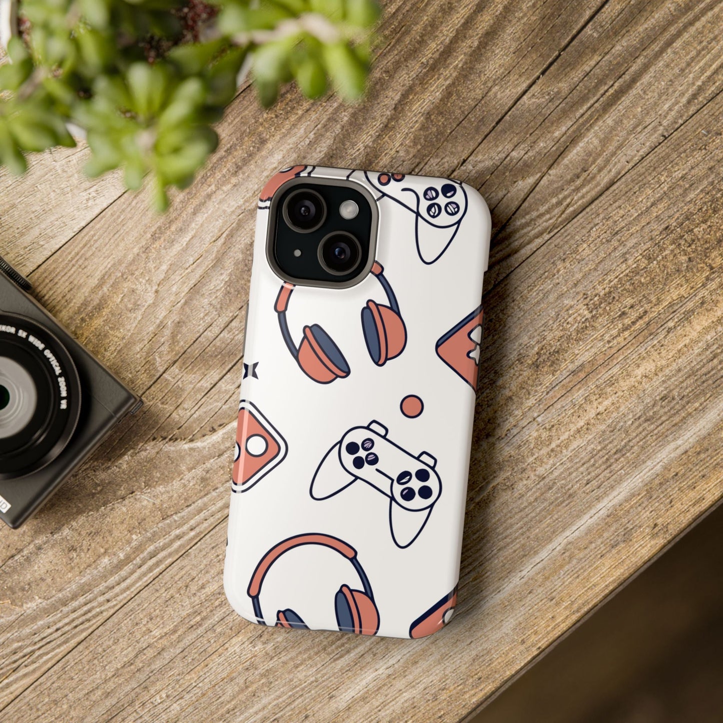 Gamer iPhone tough case with colorful gaming controller and headset design on durable protective shell