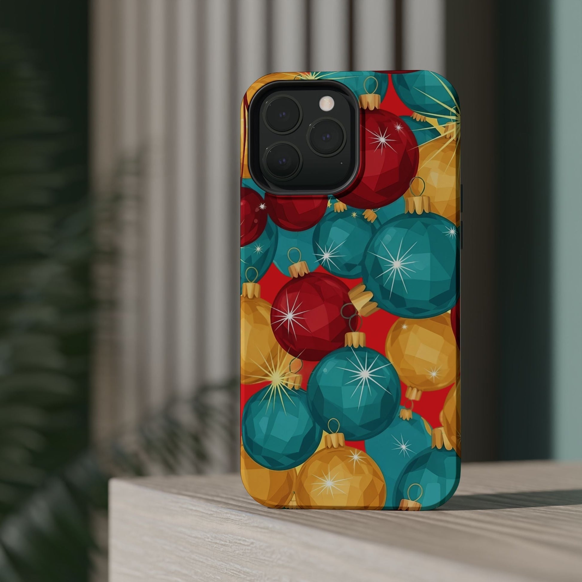 iPhone case with colorful Christmas Tree Sparkle Bulbs design in red, teal, and gold colors with MagSafe compatibility and durable protection