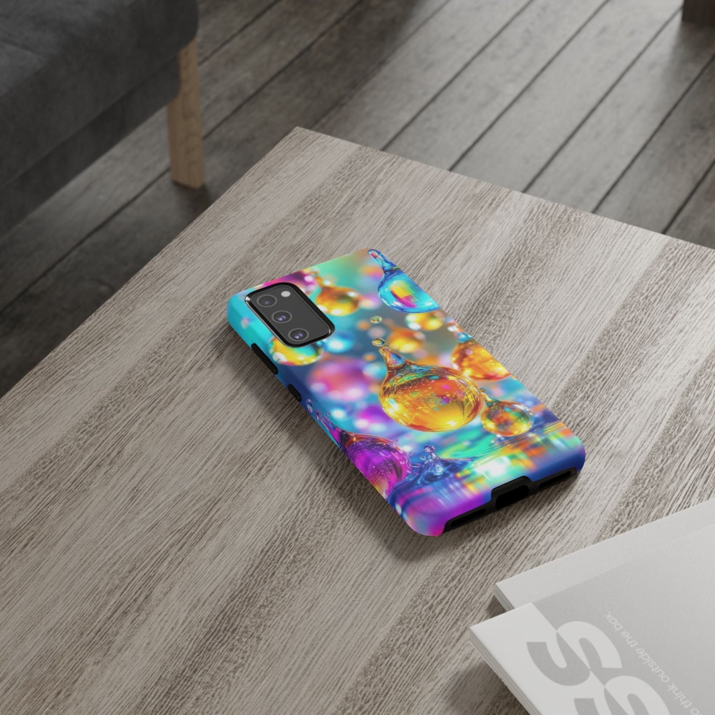 Samsung phone with colorful Golden Raindrop Phone Case featuring 3D wrap design for shock and impact protection