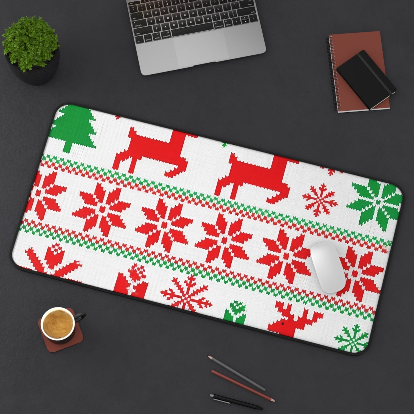 Festive Ugly Sweater Inspired Desk Mat with red and green holiday patterns on white background