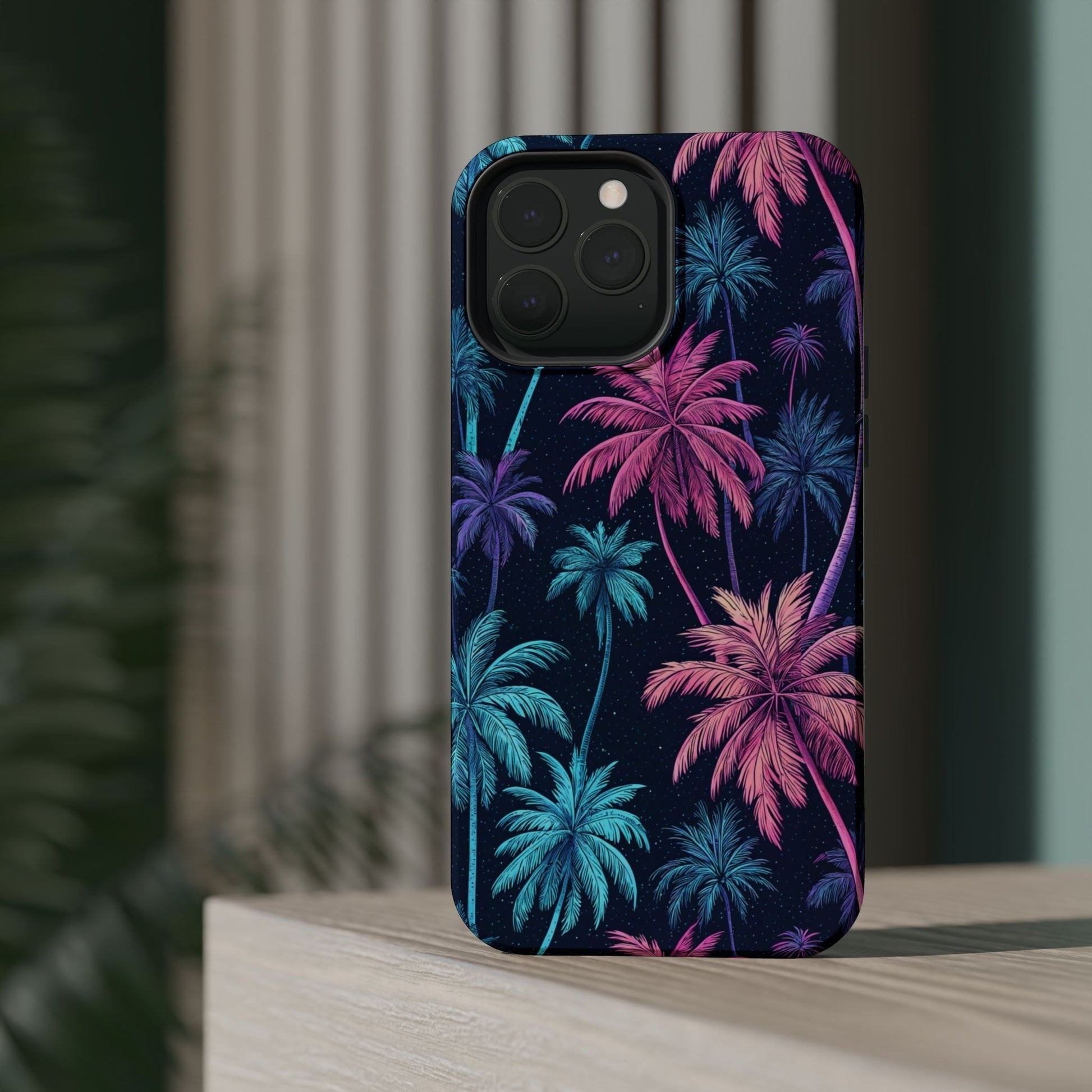 iPhone case with vibrant neon palm trees design in pink and blue on a dark background, compatible with MagSafe® and offering dual-layer protection.