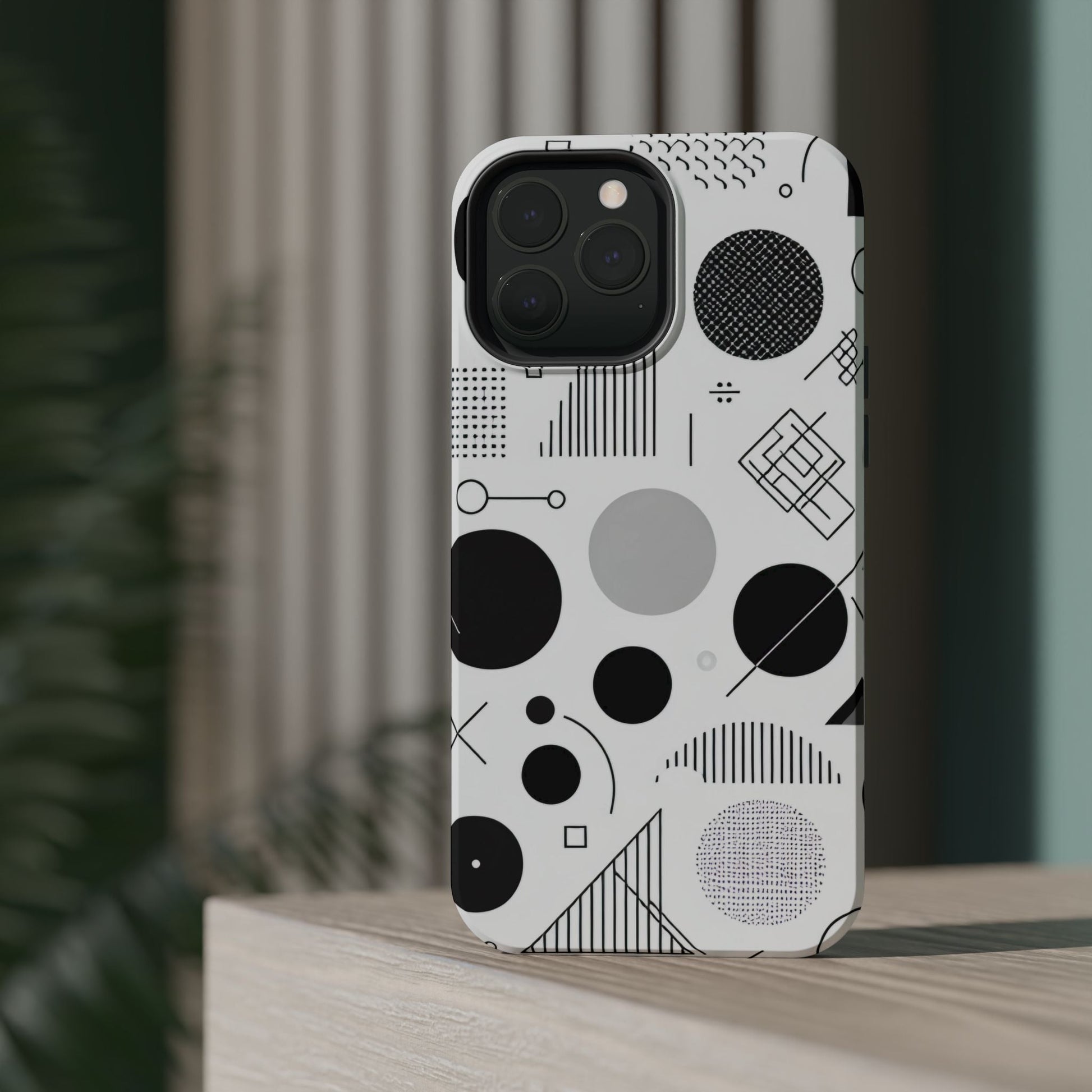 Black and white abstract art iPhone case with geometric patterns and MagSafe compatibility