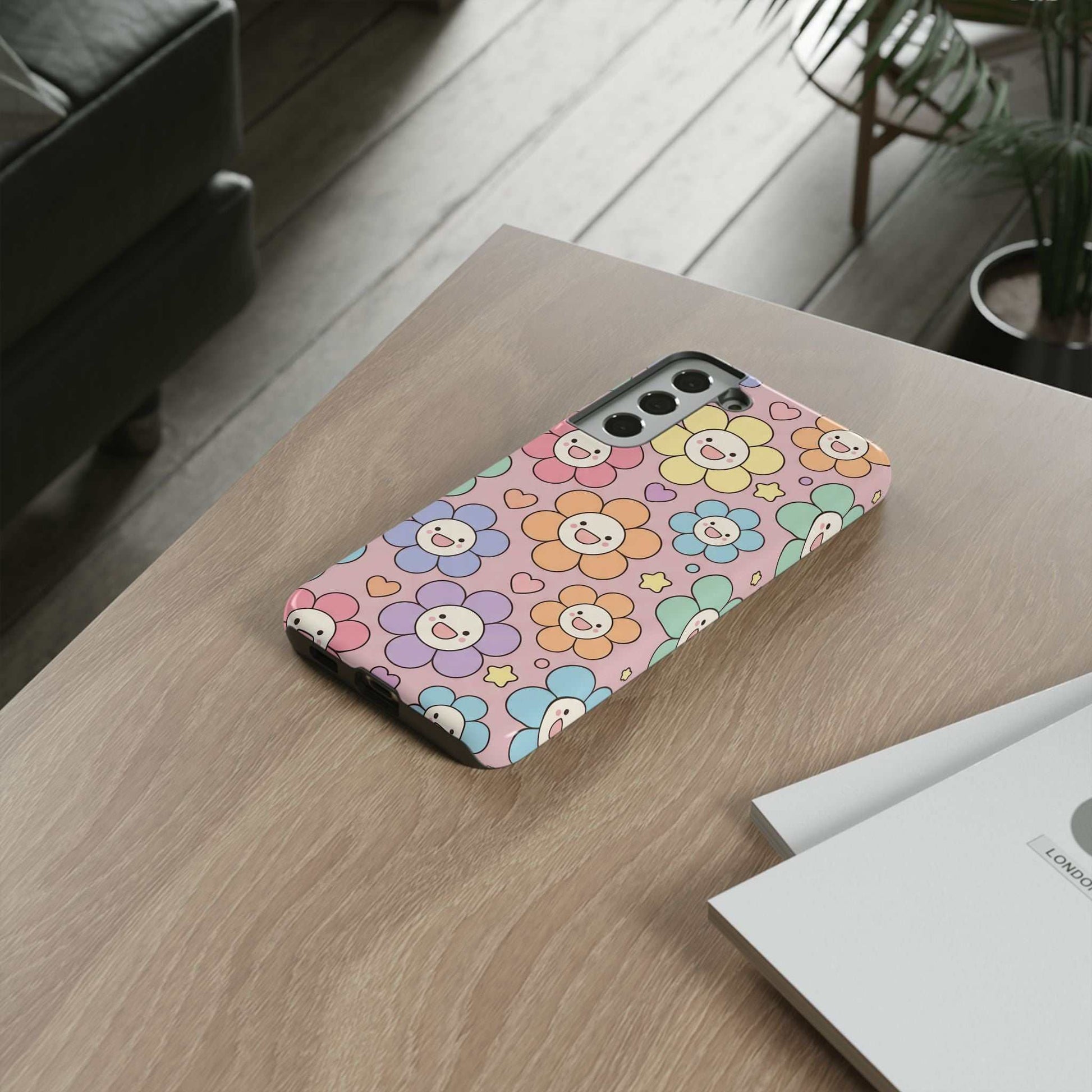 Happy Flower Samsung Phone Case with colorful floral design and dual-layer protection on wooden table