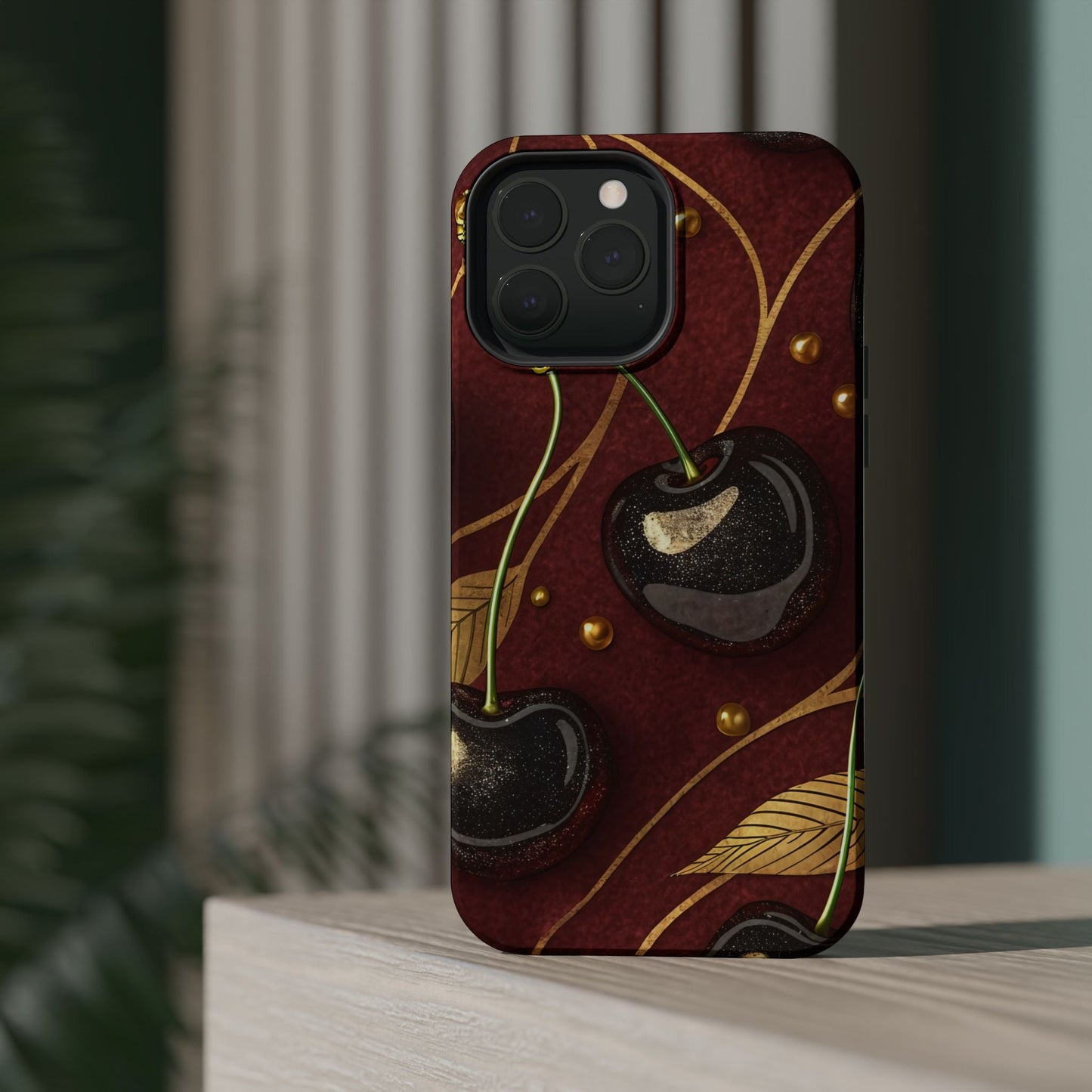 Golden Cherry iPhone Tough Case with vibrant cherry-gold design and MagSafe compatibility on iPhone model