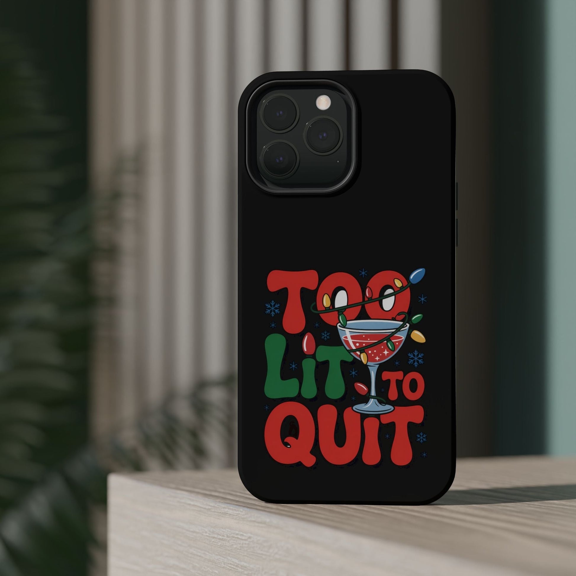Holiday themed iPhone case with "Too Lit to Quit" festive design and magnetic tough protection