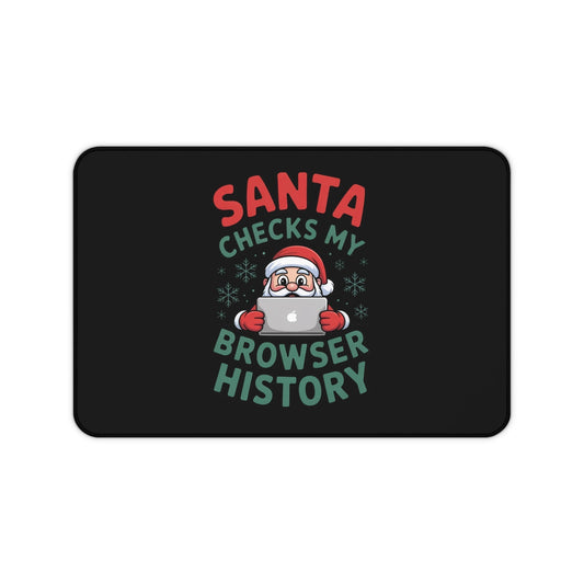 Funny Santa desk mat with Santa checking laptop browser history and festive design