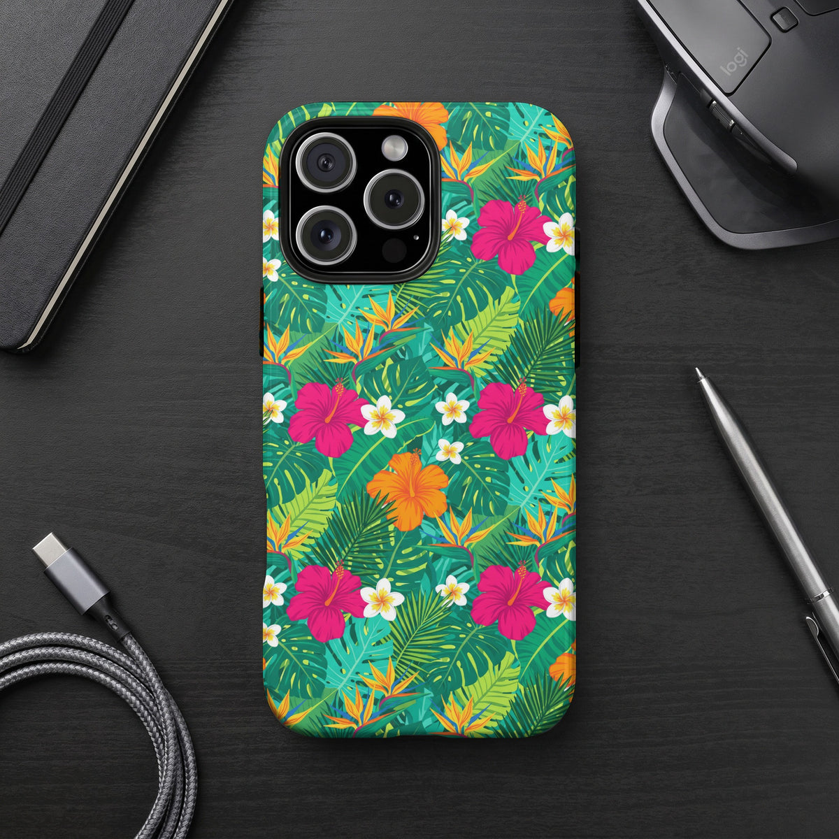 iPhone case with a tropical floral and leaf pattern in vibrant colors.