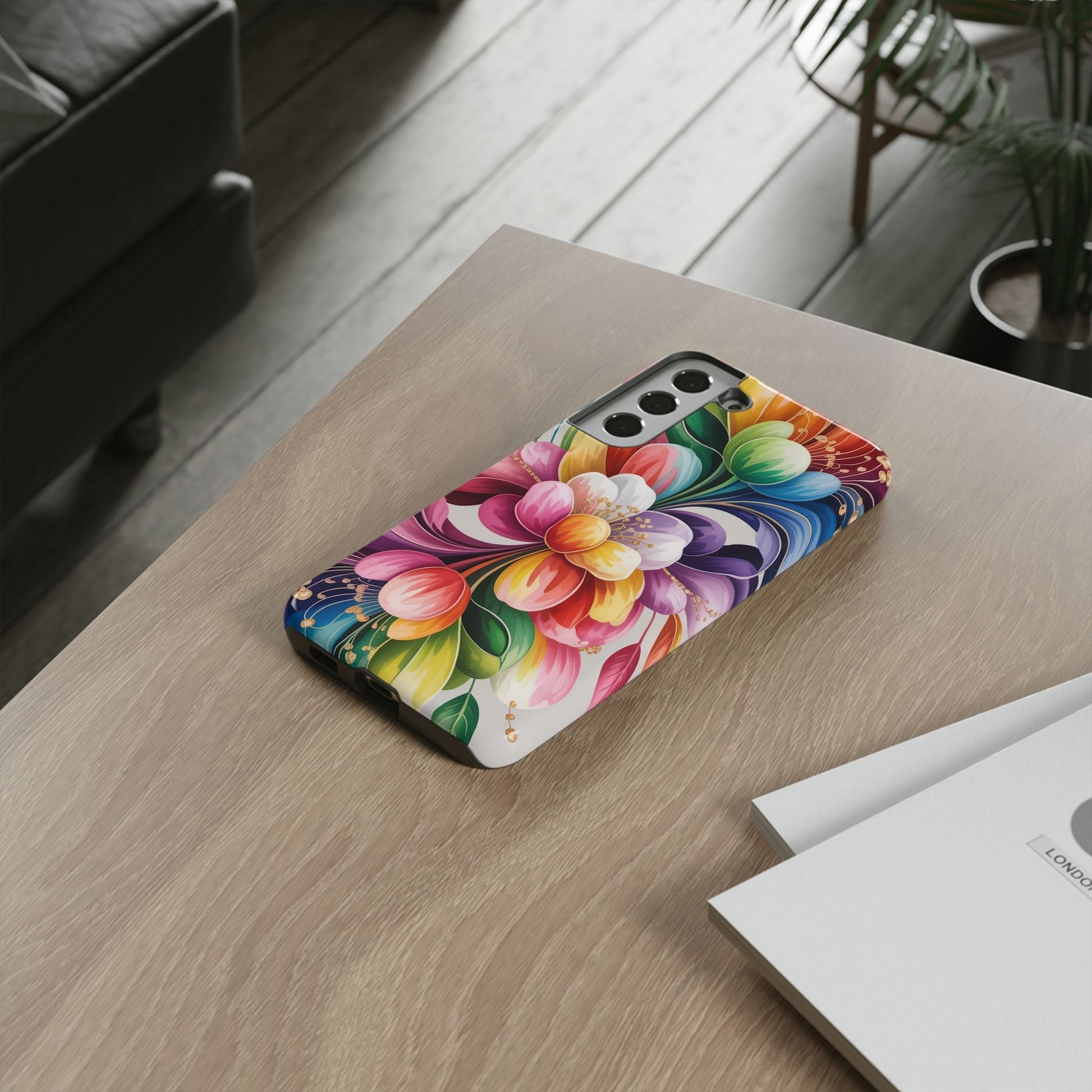 Vibrant floral Samsung case with colorful flower design and durable protective materials on wooden table