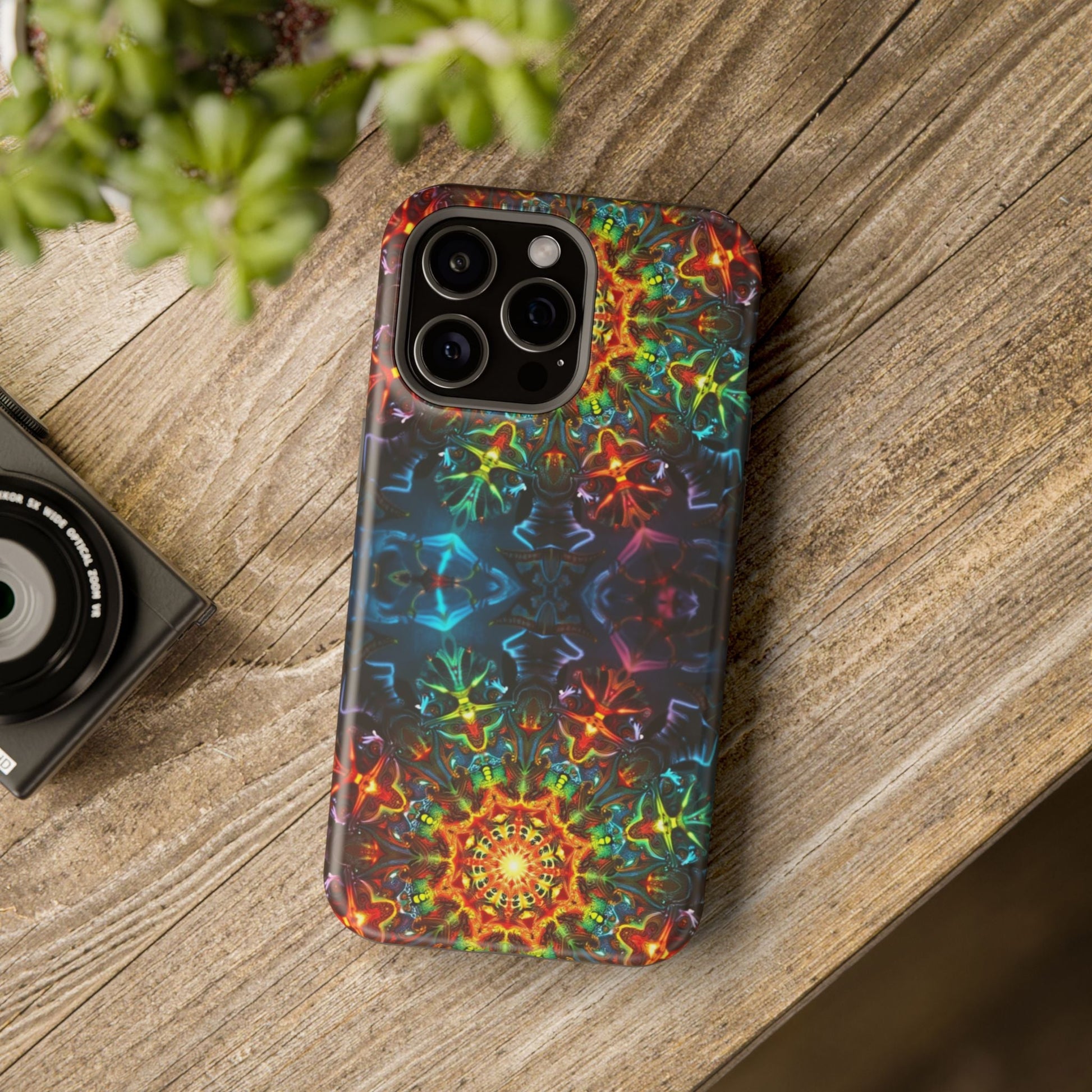 iPhone case with vibrant abstract kaleidoscope design, durable dual-layer protection, and MagSafe compatible