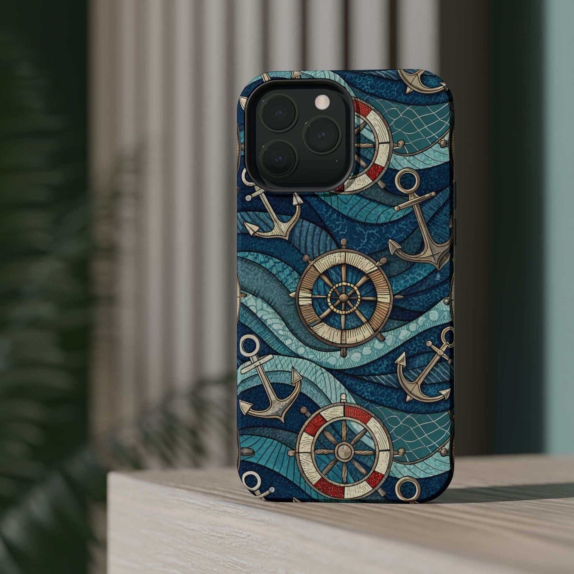 Nautical Theme iPhone case with anchors, ship wheels, and ocean waves design in blue tones for iPhone 13-16 series.