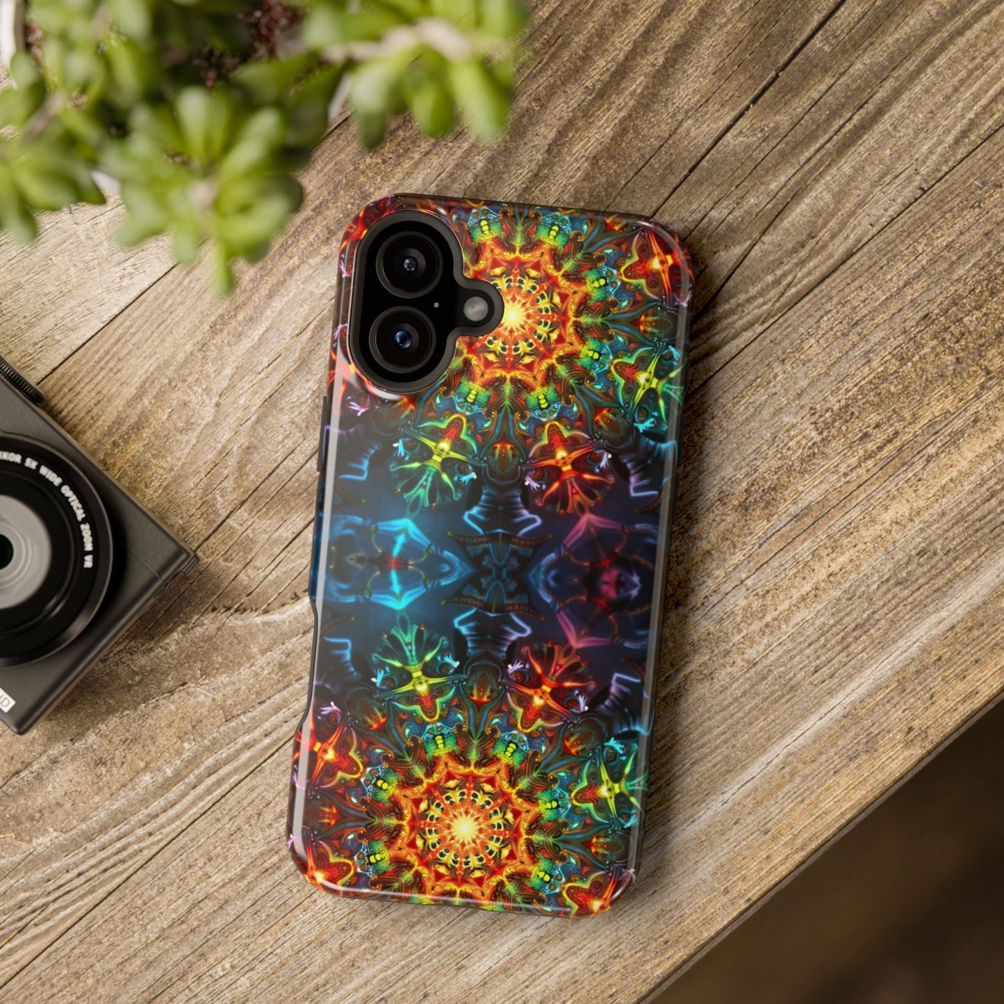 iPhone case with vibrant abstract kaleidoscope design and durable dual-layer protection