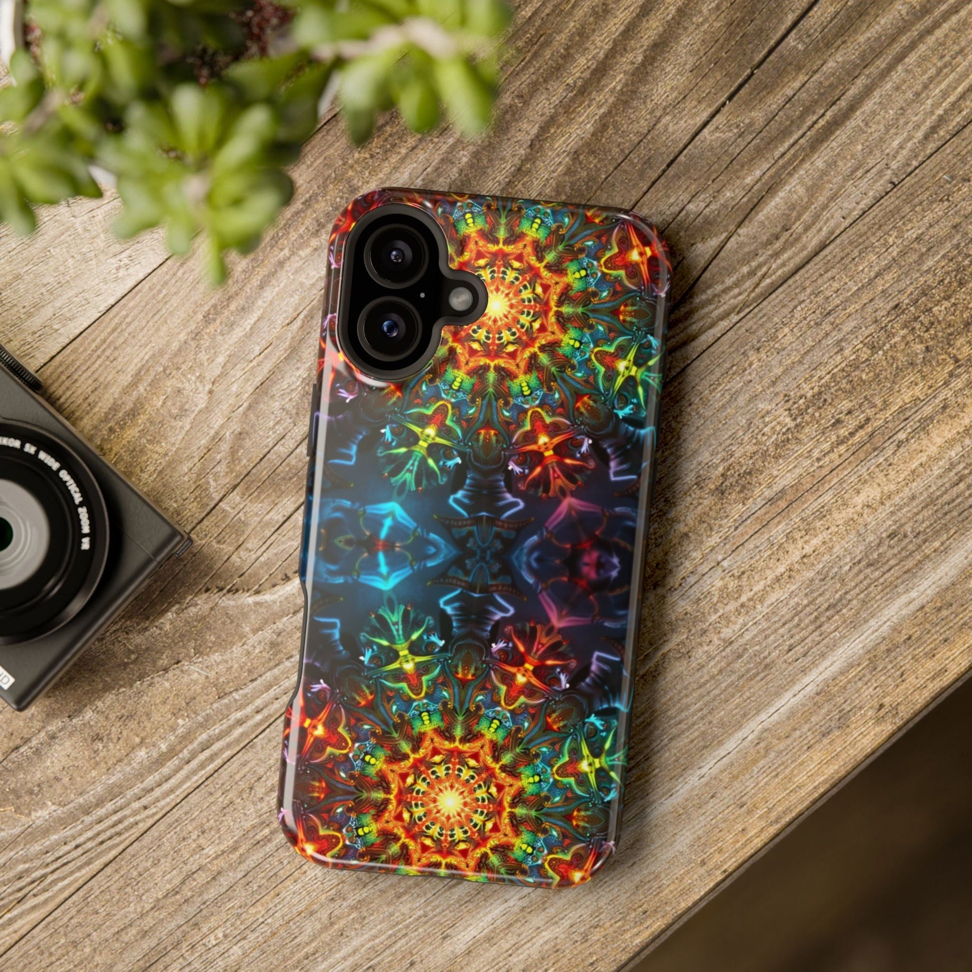 iPhone case with vibrant abstract kaleidoscope design and durable dual-layer protection