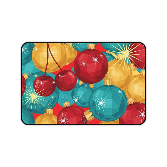 Holiday-themed desk mat with vibrant red, gold, and blue Christmas bulb design and sparkling accents.