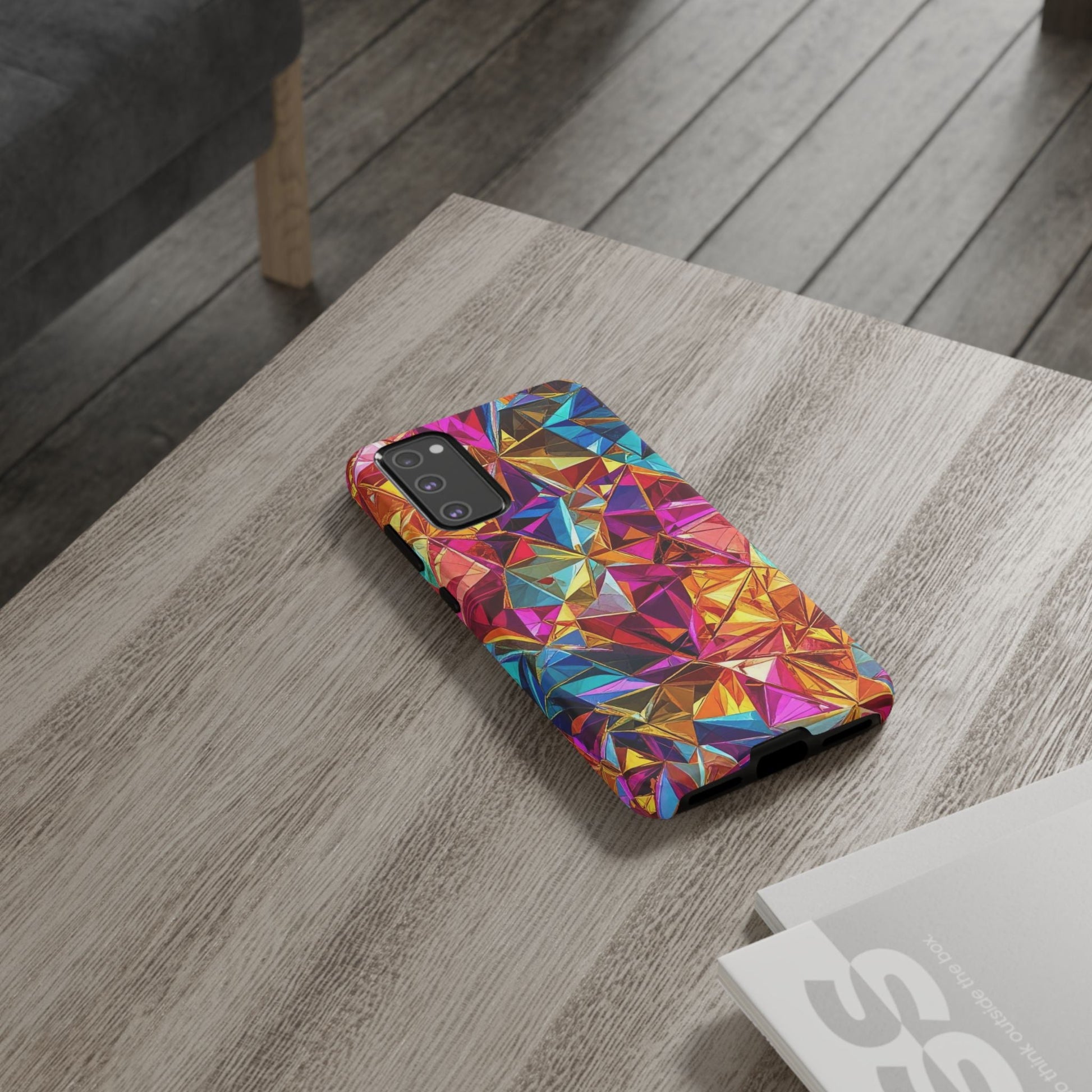 Samsung phone with vibrant rainbow foil geometric pattern tough case on wooden table