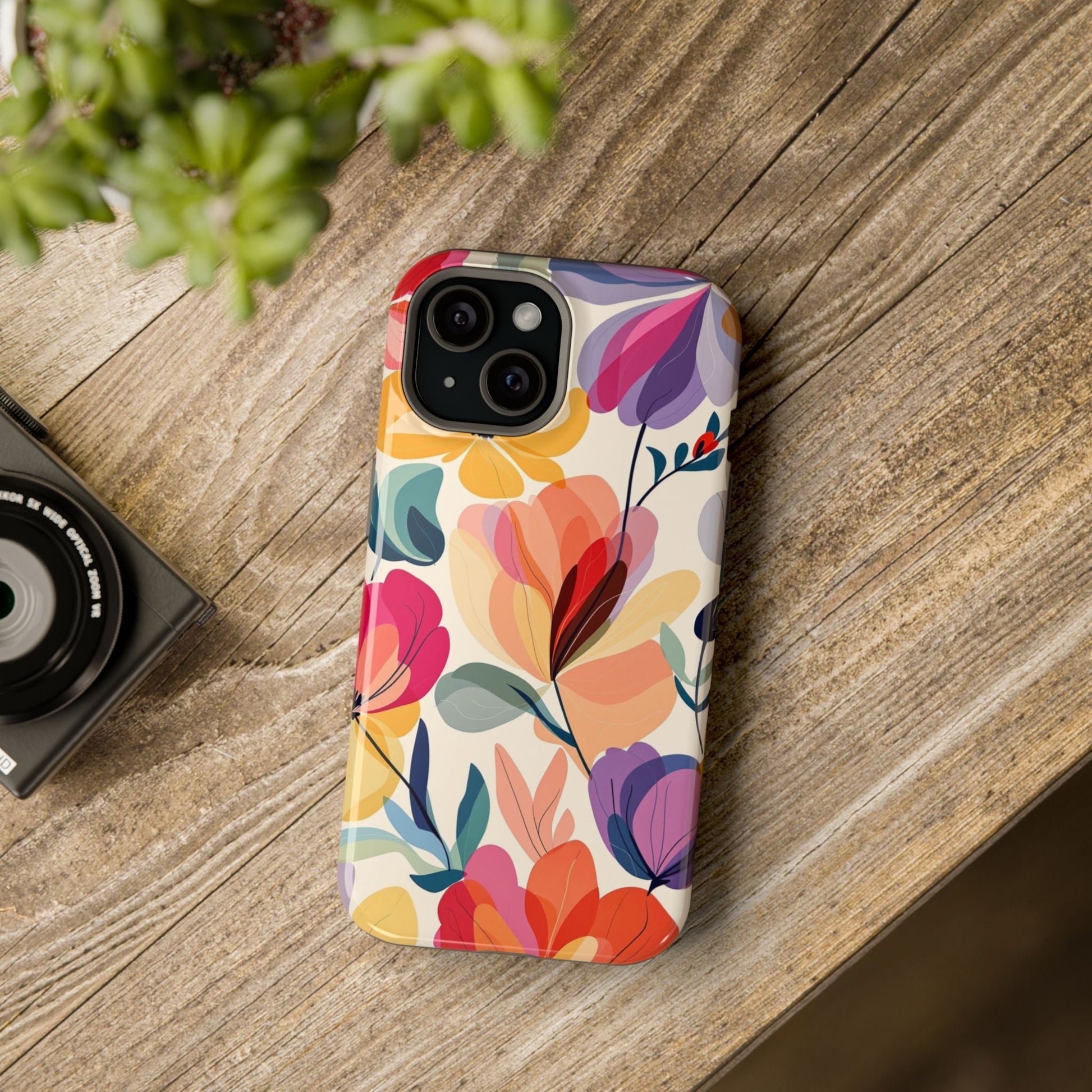 Colorful watercolor floral iPhone case with vibrant artistic design and durable polycarbonate construction