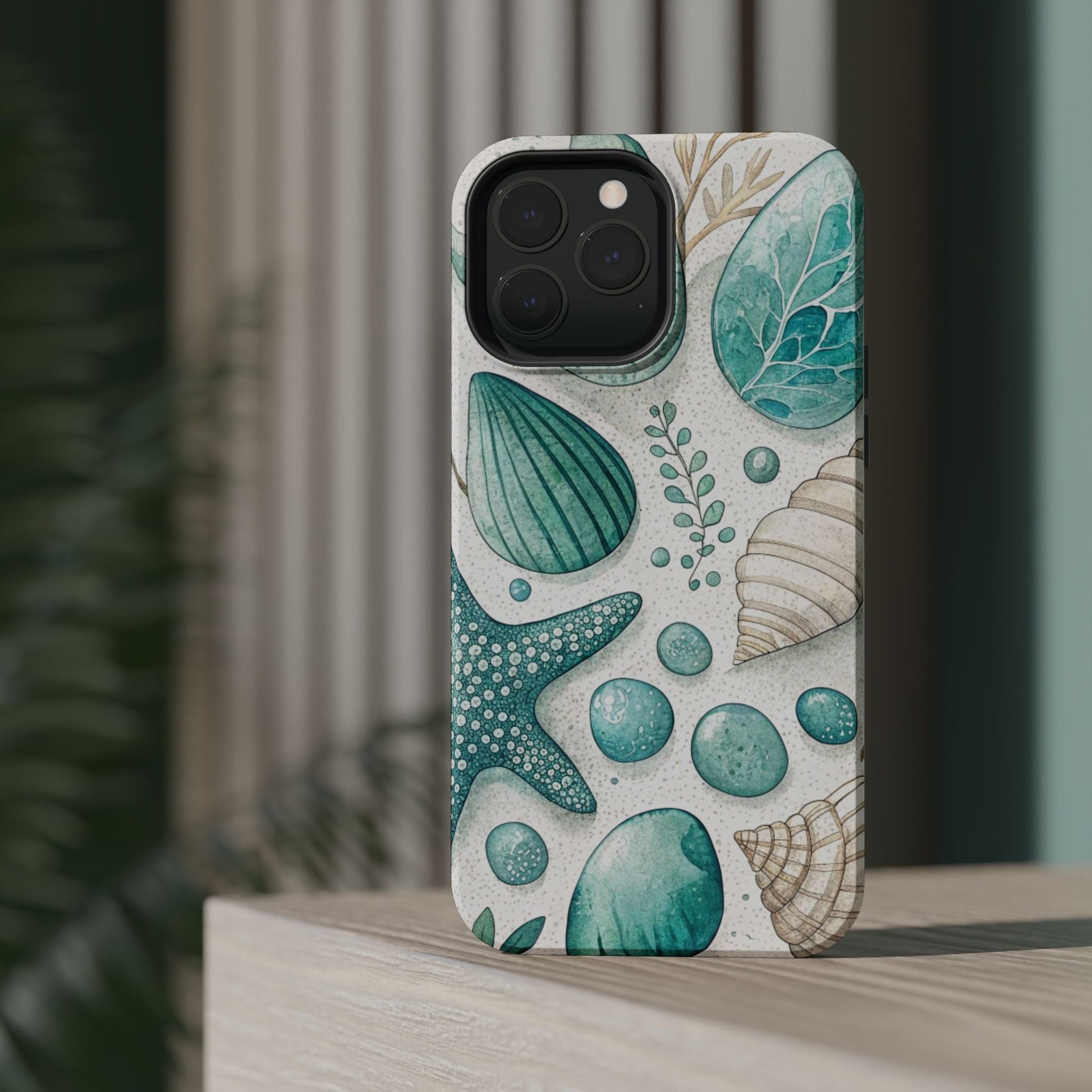Celebration Sea iPhone Tough Case with vibrant sea shell and starfish design, durable protective dual-layer cover with MagSafe magnet.