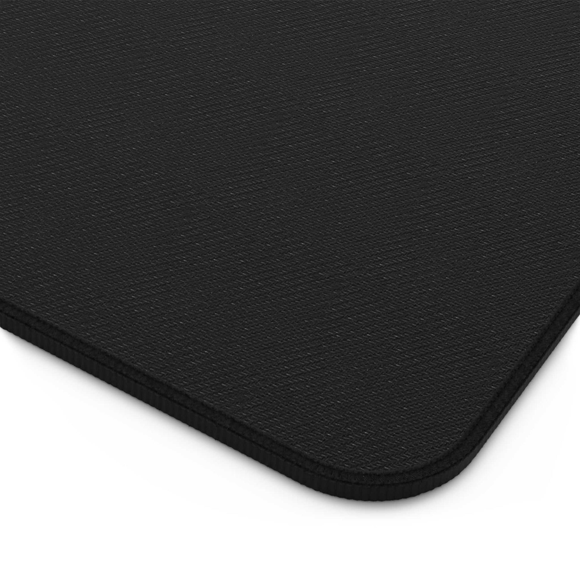 black neoprene desk pad with non-slip bottom and hemmed edges for office use