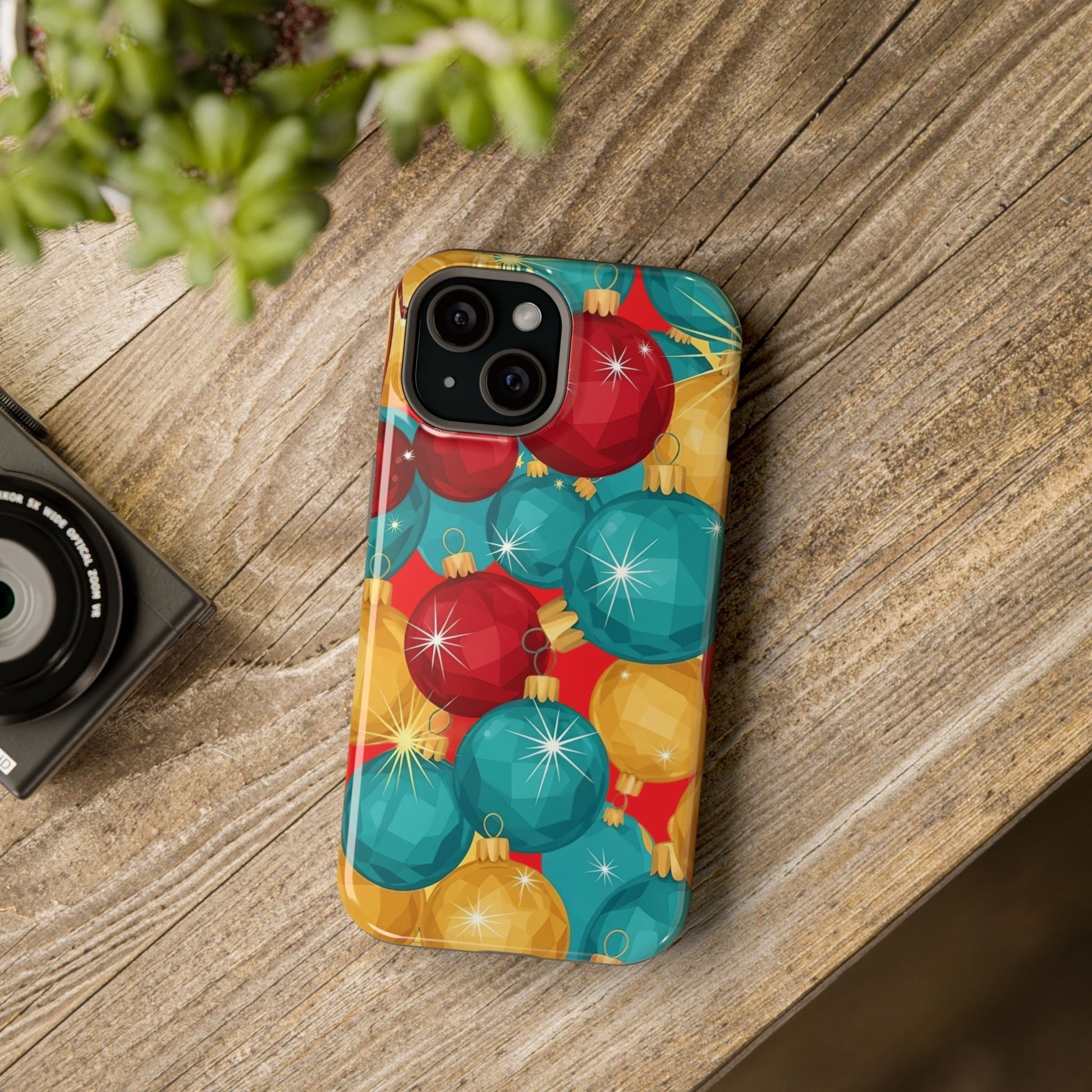 iPhone case with colorful Christmas Tree Sparkle Bulbs design on wooden surface