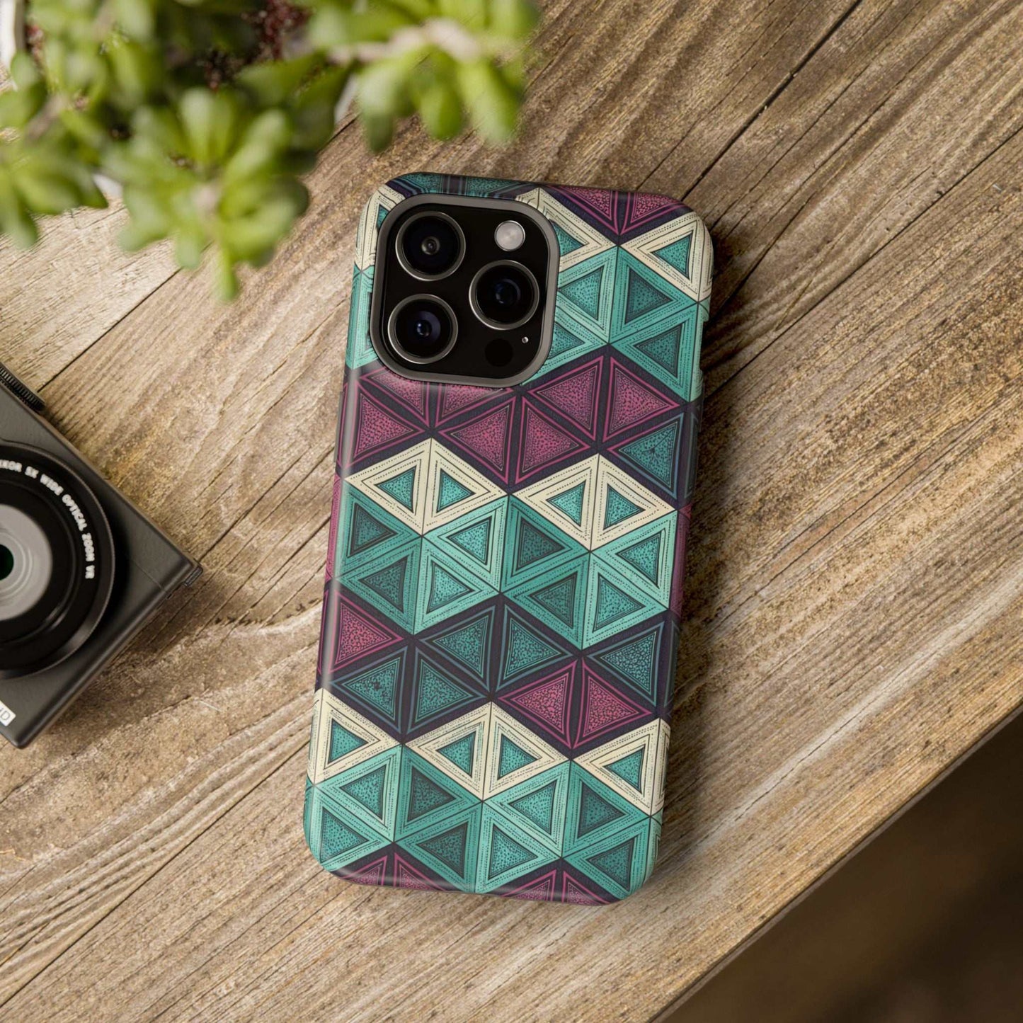 Purple and Teal Abstract geometric patterned magnetic iPhone tough case with MagSafe compatibility on wooden surface