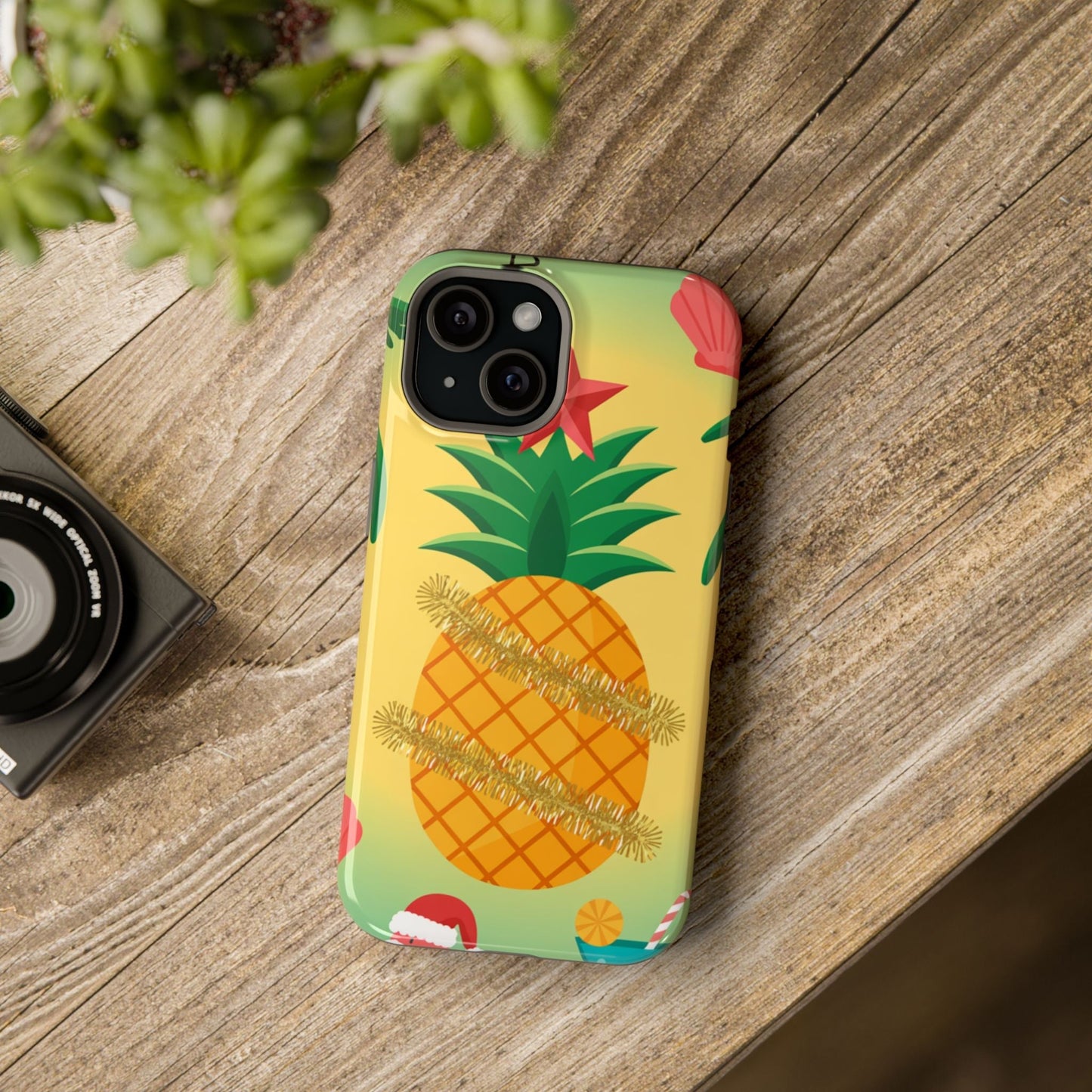iPhone case with festive pineapple Christmas design and MagSafe compatibility