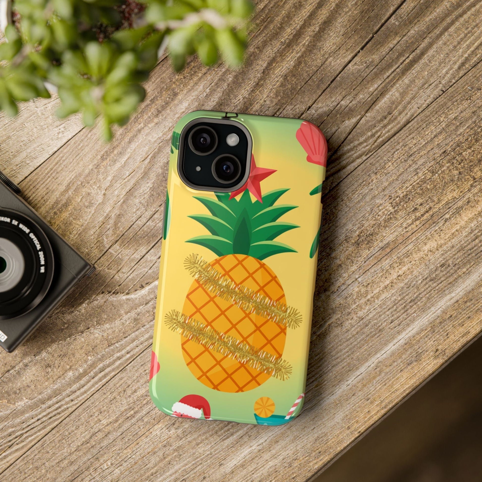 iPhone case with festive pineapple Christmas design and MagSafe compatibility