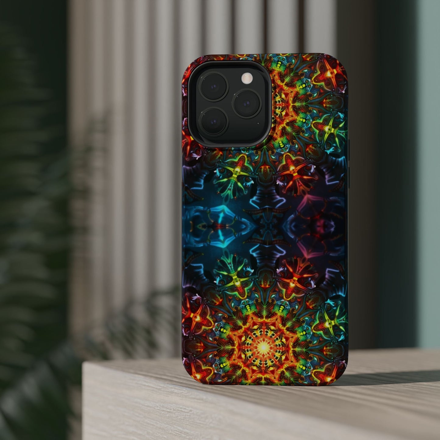 iPhone case with vibrant abstract kaleidoscope design, durable dual-layer protection, and colorful artistic pattern