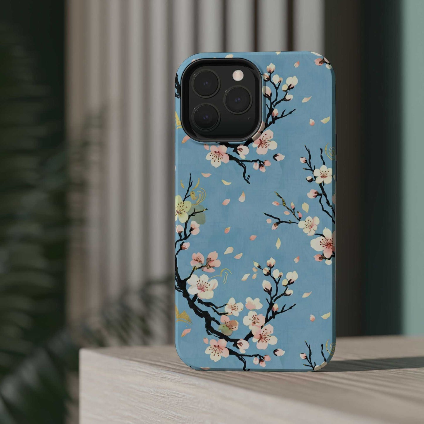 Spring Bloom iPhone Tough Case with floral print and MagSafe compatibility on wooden surface