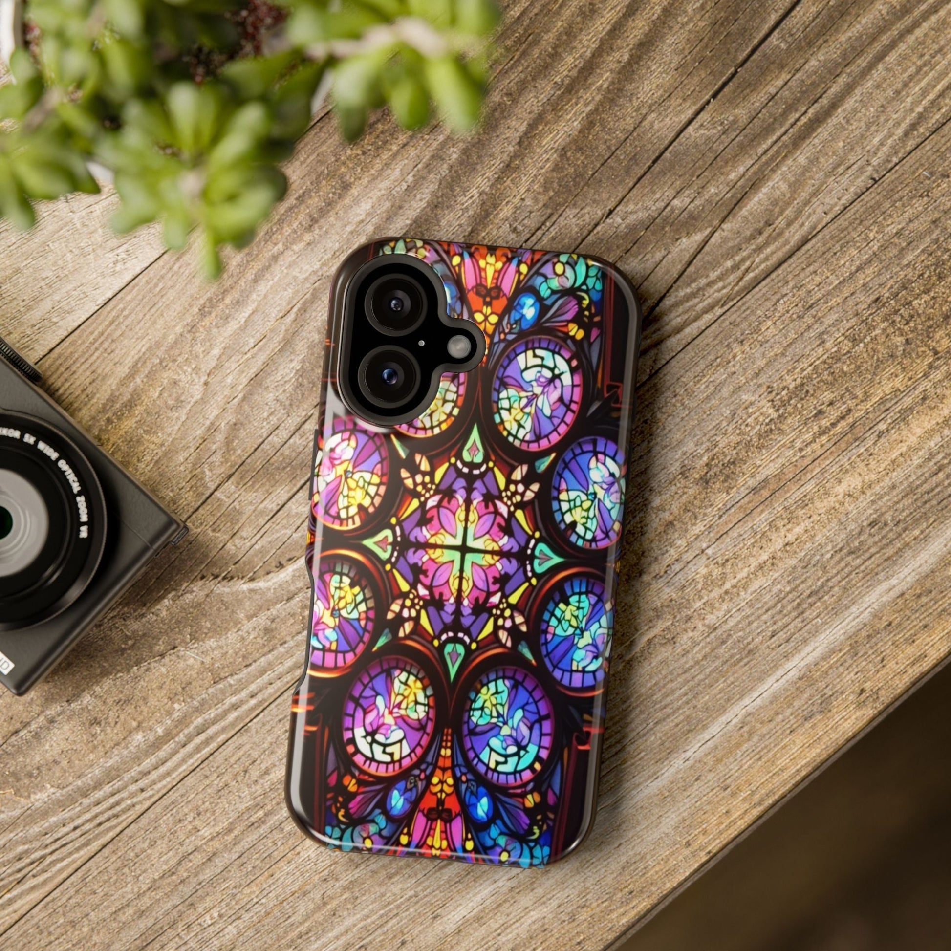 Colorful Hypnotic Stain Glass iPhone tough case with vibrant stained-glass design on wooden surface