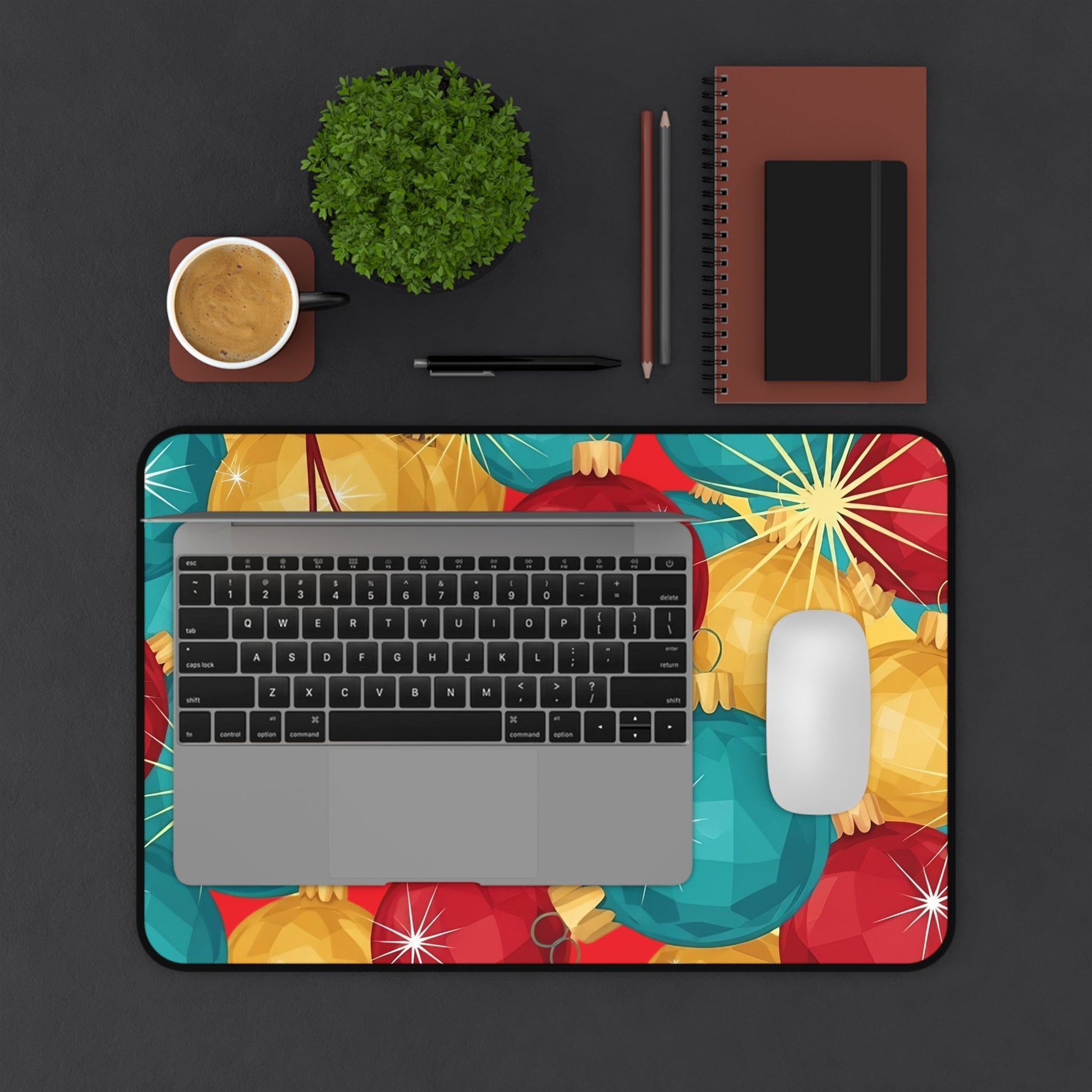 Holiday-themed desk mat with colorful Christmas tree bulb design under laptop and mouse on workspace