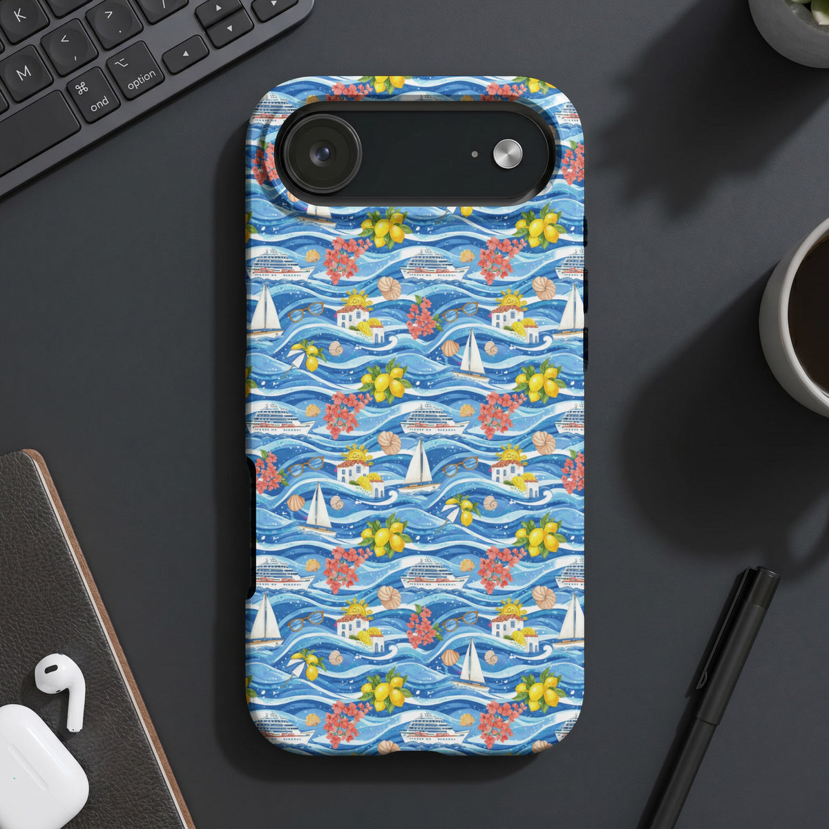 Phone case with a repeating pattern of cruise ships, sailboats, and tropical elements on blue waves.
