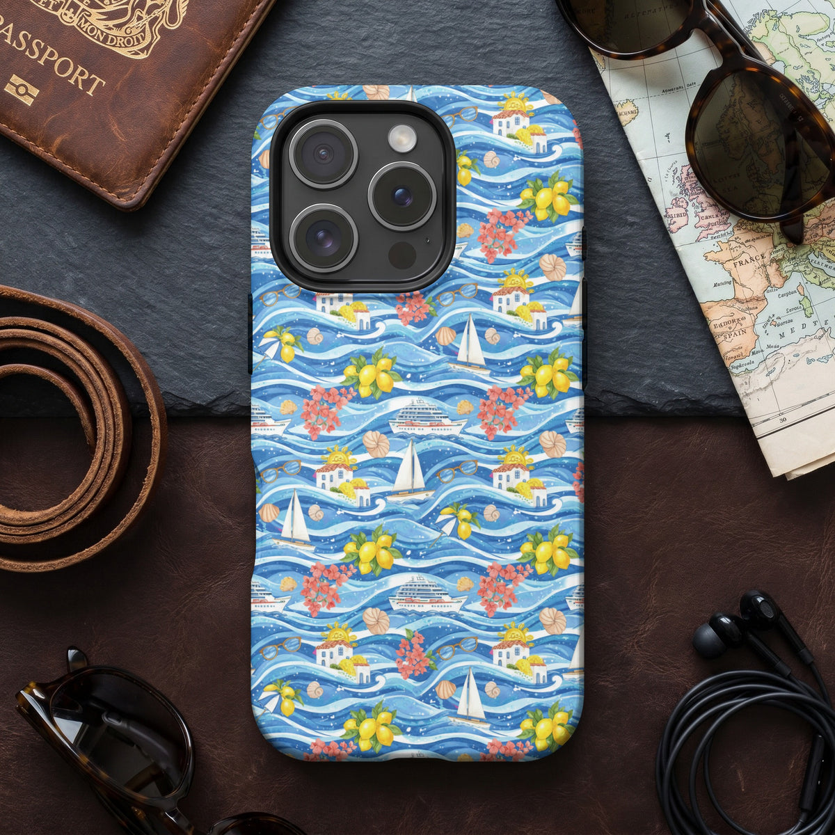 iPhone case with a blue wavy sea pattern, lemons, boats, and houses.