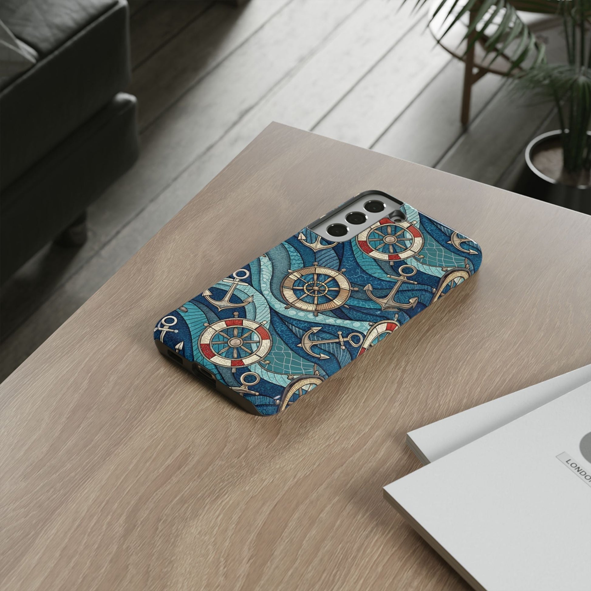 Samsung phone case with nautical anchor and life preserver design on a wooden table
