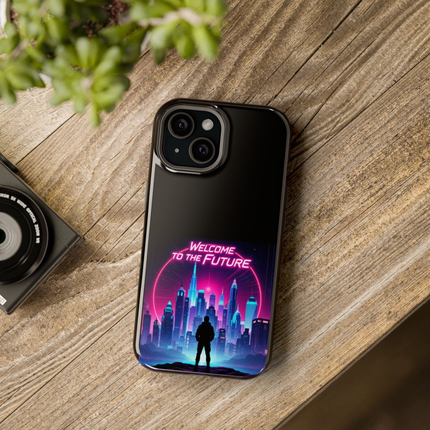 Futuristic Vibe iPhone Case with neon cityscape design and "Welcome to the Future" text, durable MagSafe® tough case on wood surface