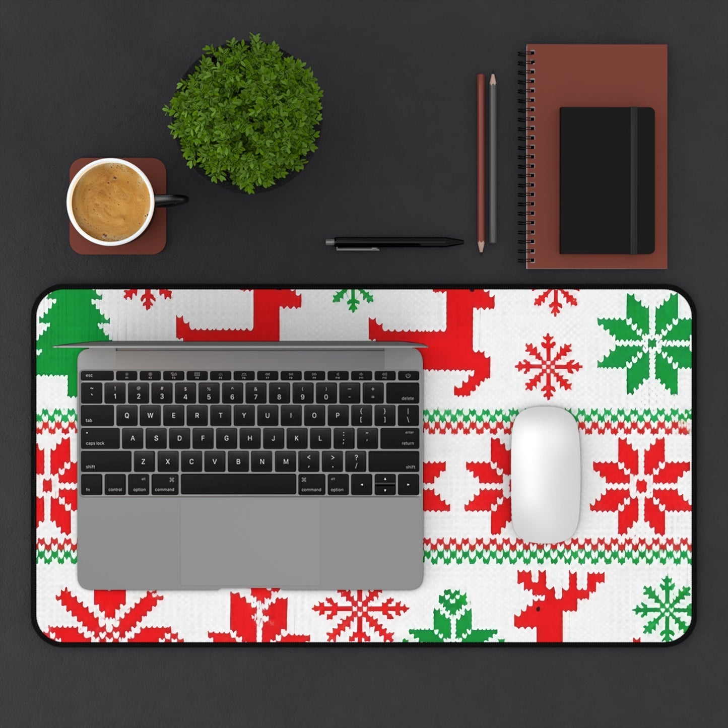 Festive Ugly Sweater Inspired Desk Mat with red and green holiday patterns under laptop and mouse