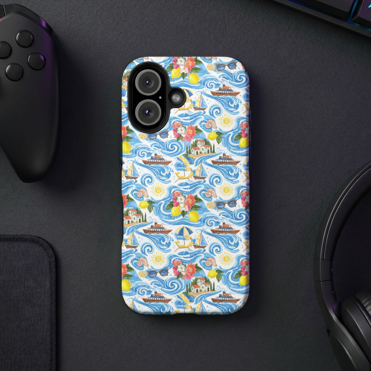 Phone case with a watercolor pattern of sailboats, yachts, lemons, and flowers on waves.