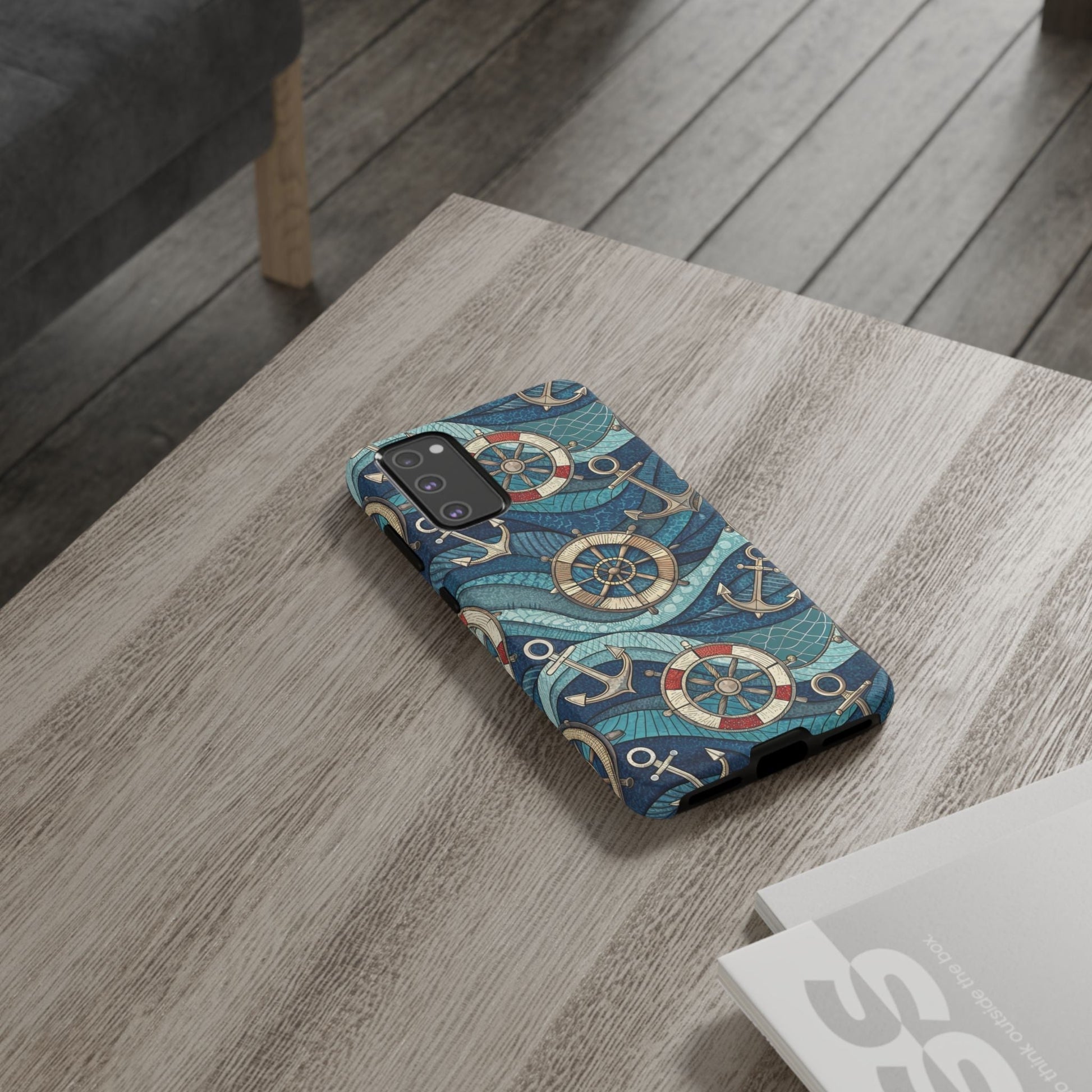 Samsung phone case with nautical anchor and life preserver design on a wooden table
