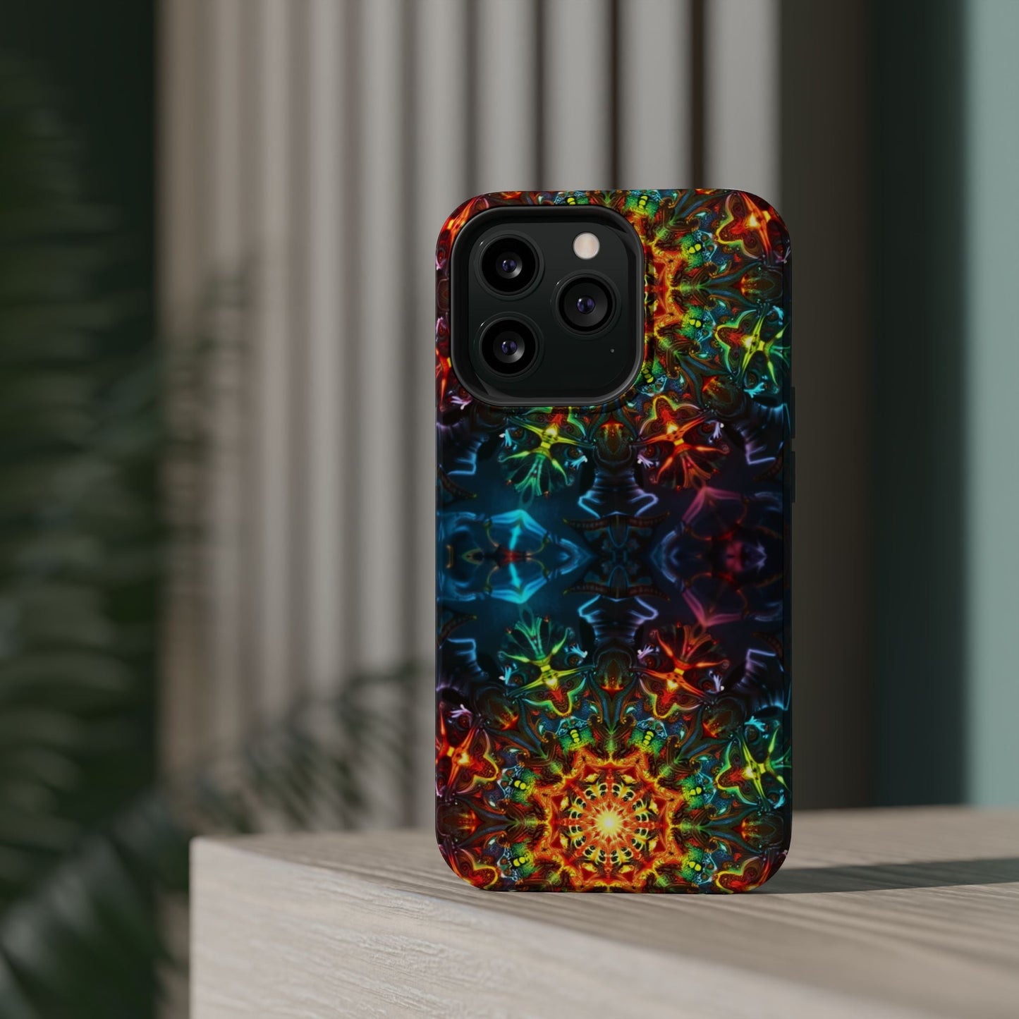 Colorful abstract kaleidoscope design iPhone case with durable dual-layer protection and MagSafe compatibility