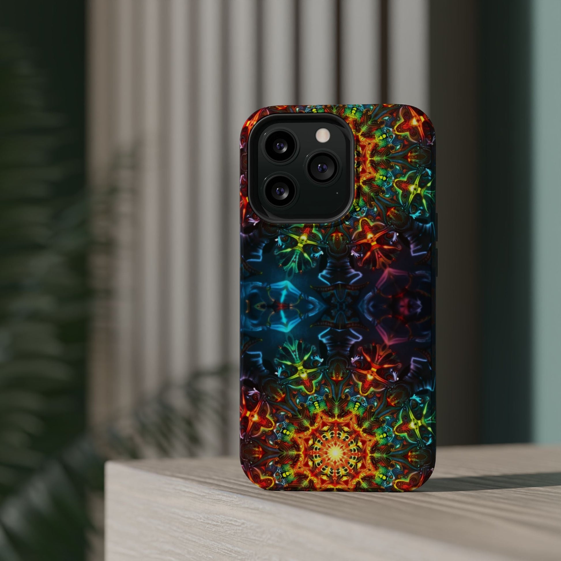 Colorful abstract kaleidoscope design iPhone case with durable dual-layer protection and MagSafe compatibility