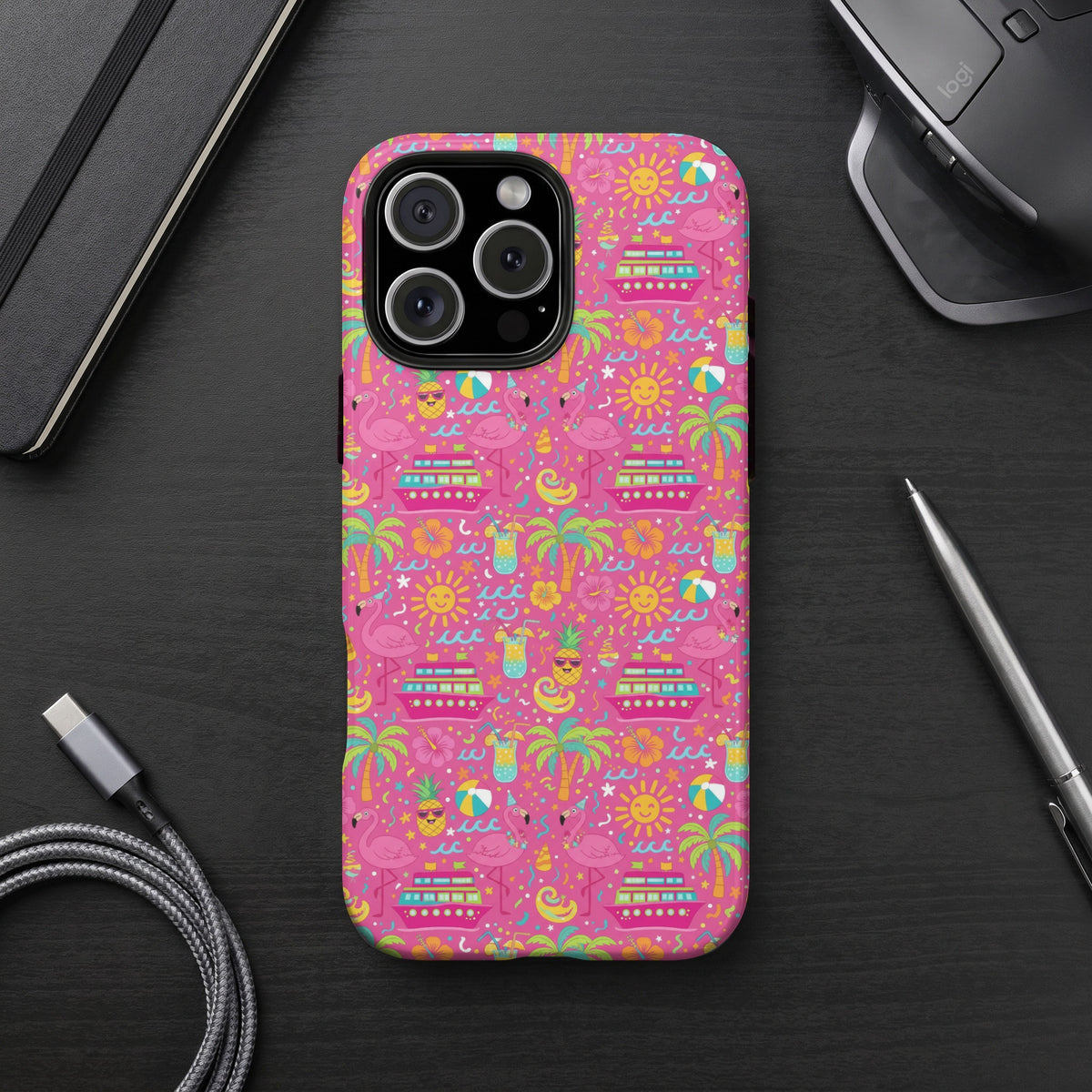 Pink phone case with tropical pattern of flamingos, cruise ships, suns, and cocktails.
