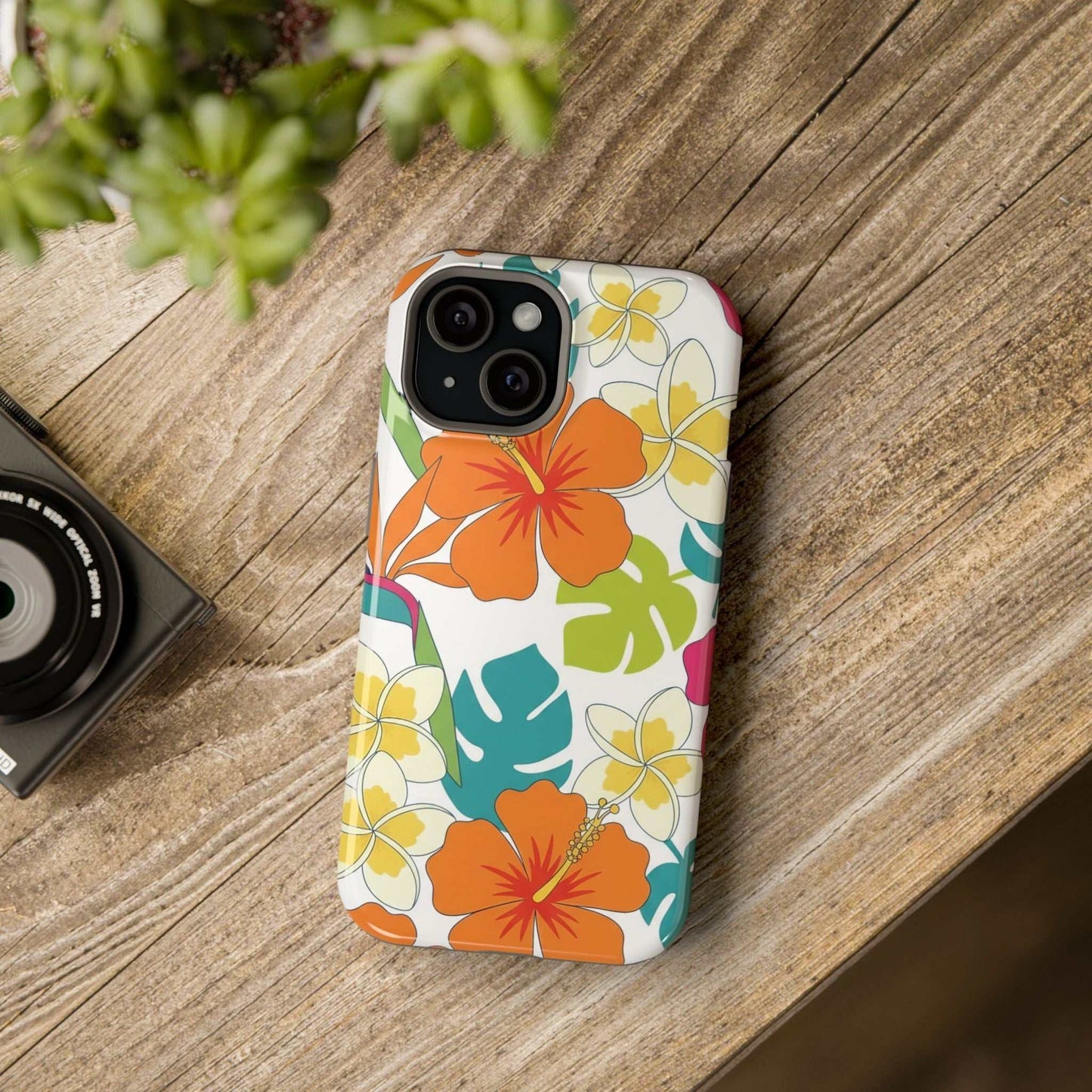 Floral iPhone case with orange hibiscus design on impact-resistant dual-layer shell