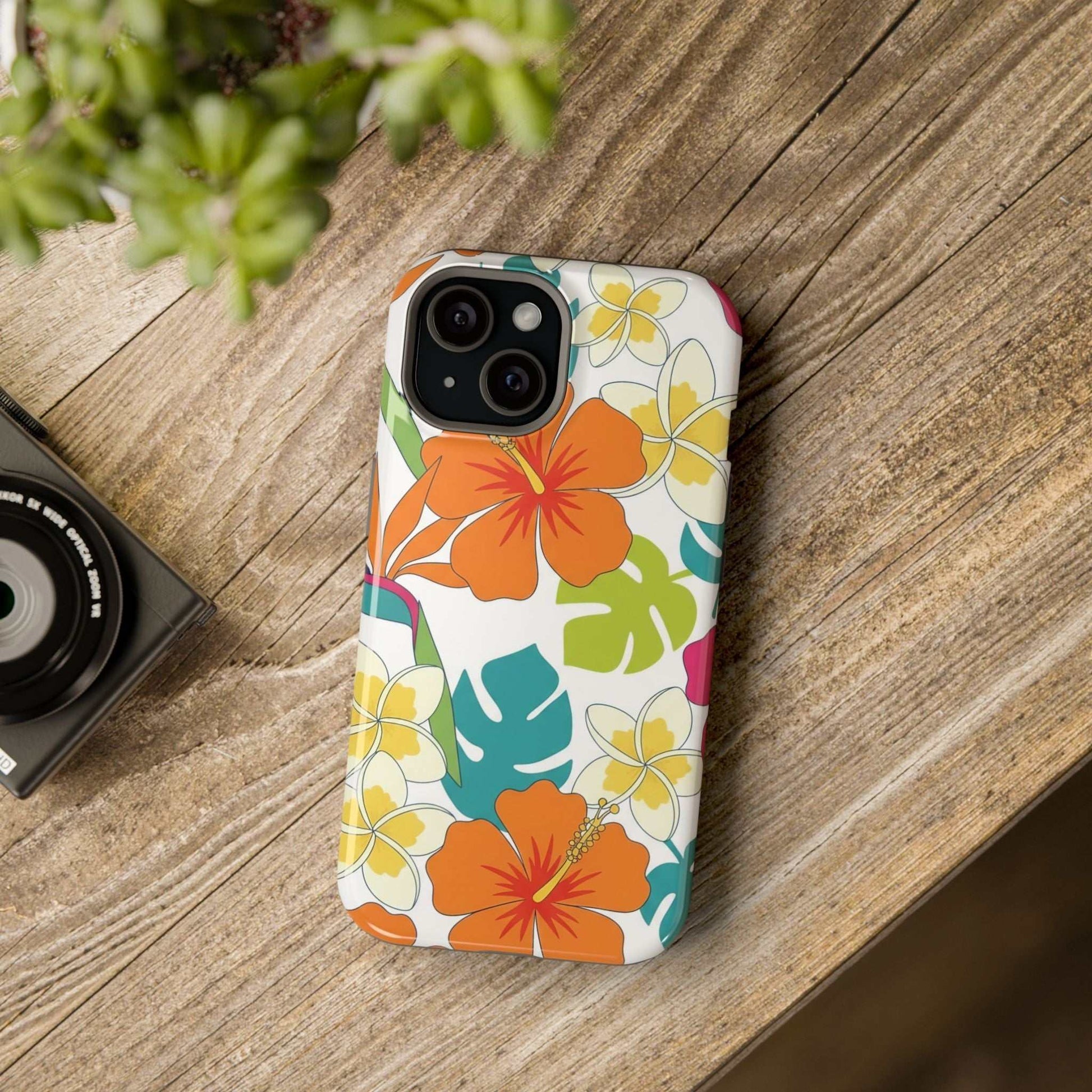 Floral iPhone case with orange hibiscus design on impact-resistant dual-layer shell